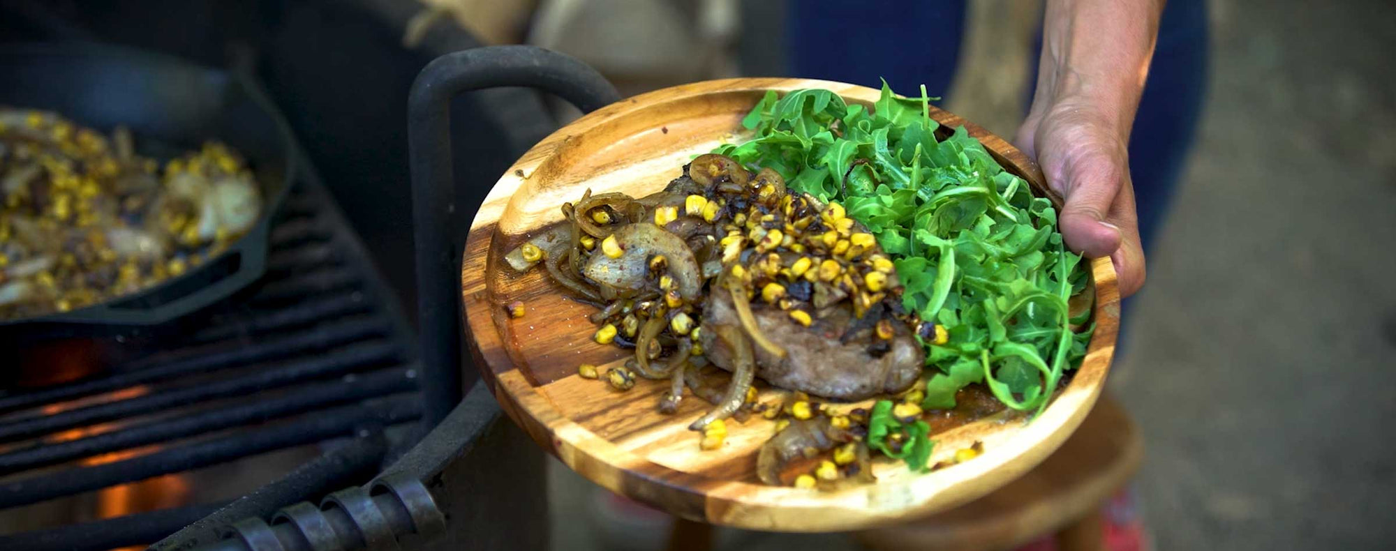 Campfire Wild Boar Chop and Corn by Chef Jessica Monty