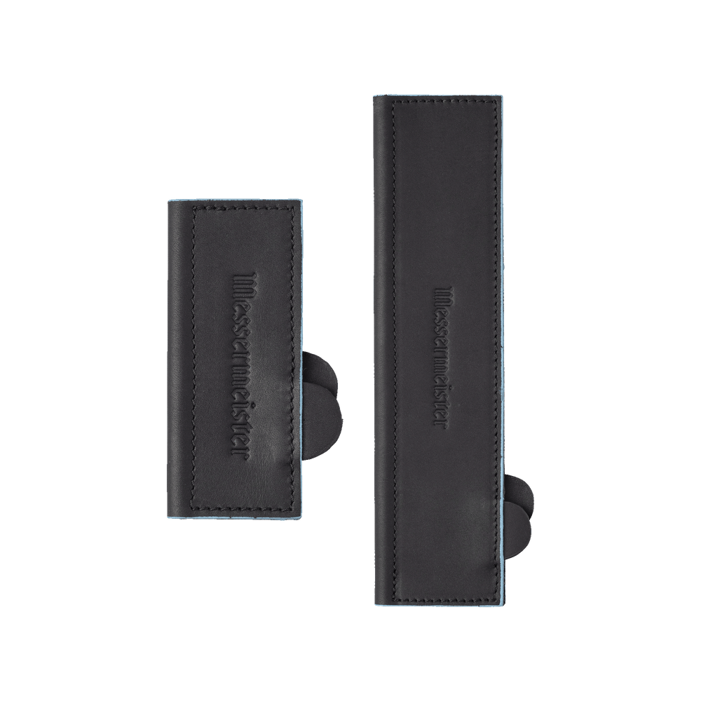 Two Messermeister black leather magnetic Edge-Guards with 'Messermeister' branding