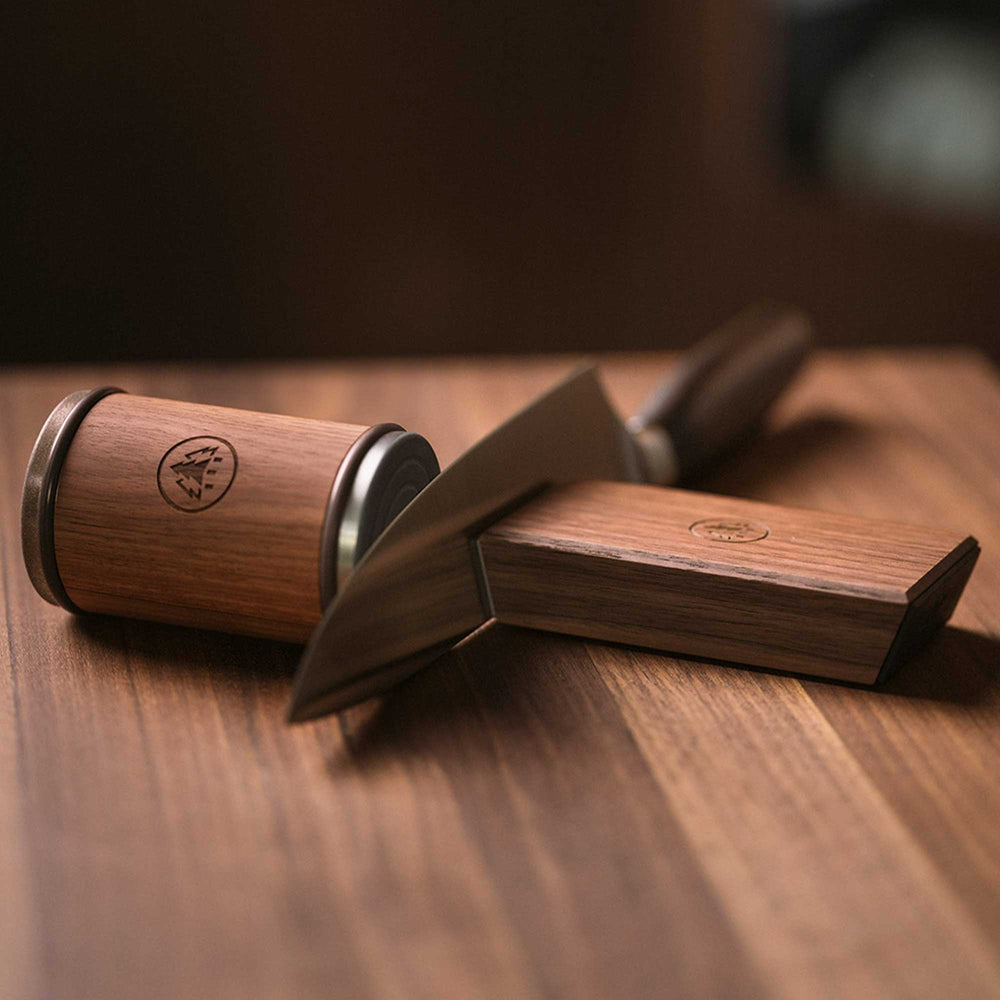 Horl 3 Walnut Rolling Sharpener Kit with Cylinder Sharpener and Angle Guide with Knife being sharpened