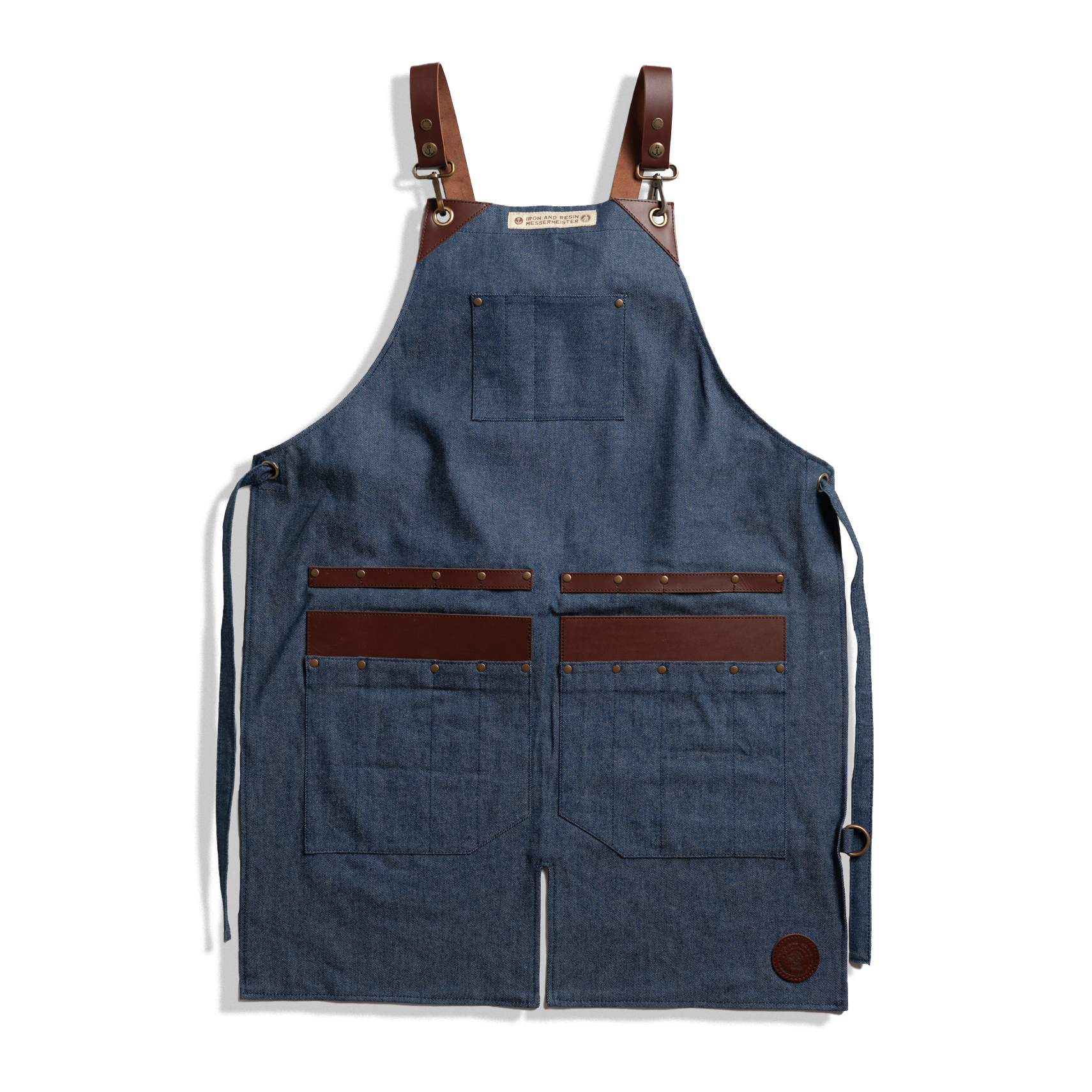 Messermeister x INR Denim Apron-Knife Roll Hybrid laid out on a plain background