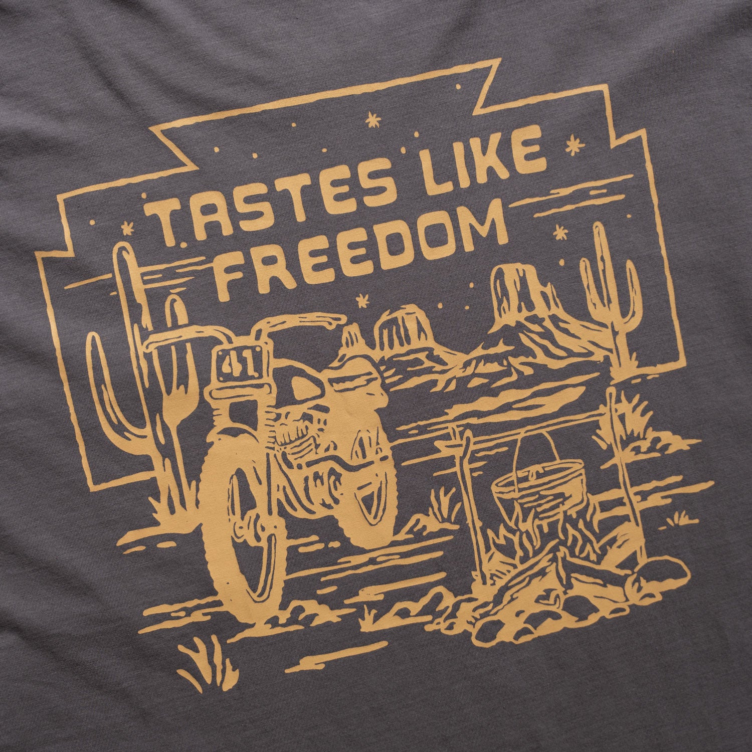 Motorcycle in the desert "tastes like freedom" yellow logo