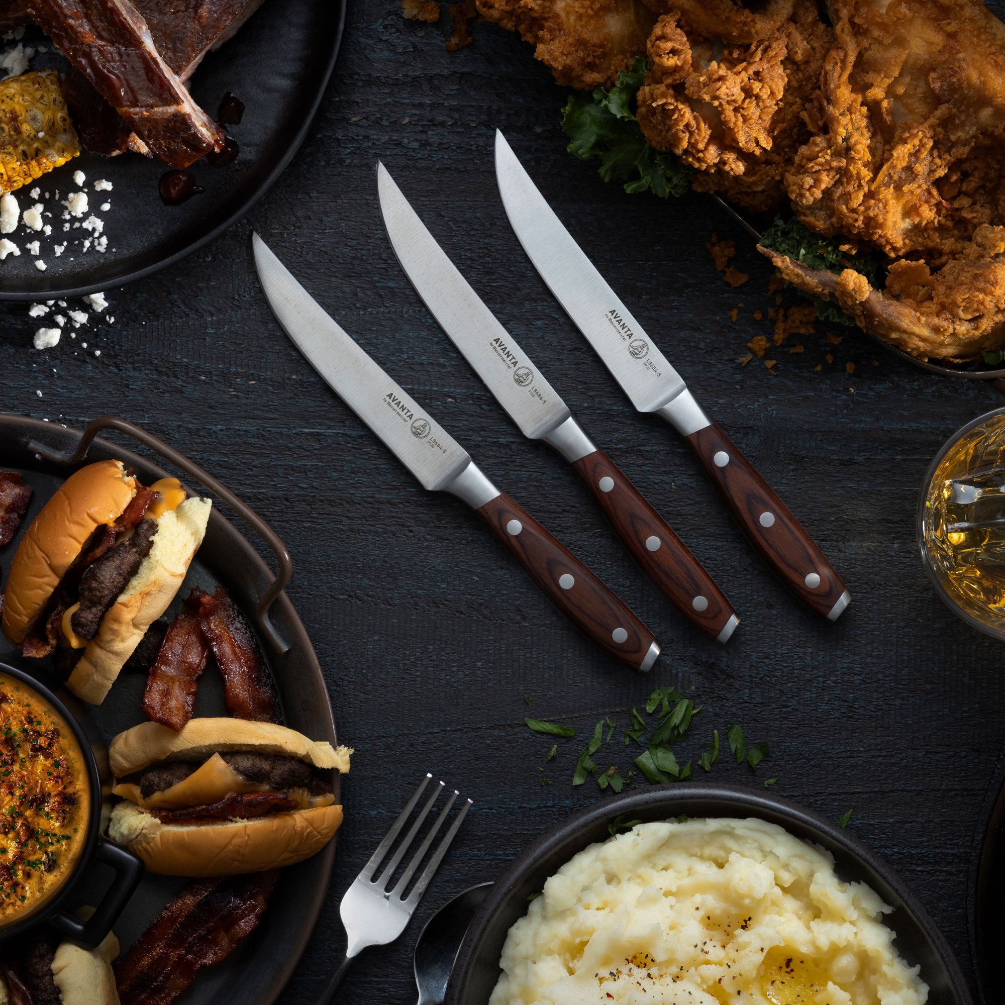 Messermeister Avanta Pakkawood Steak Knives with Dinner Setting Fried Chicken, Bourbon, Mashed Potatoes, Ribs, Burgers and Queso