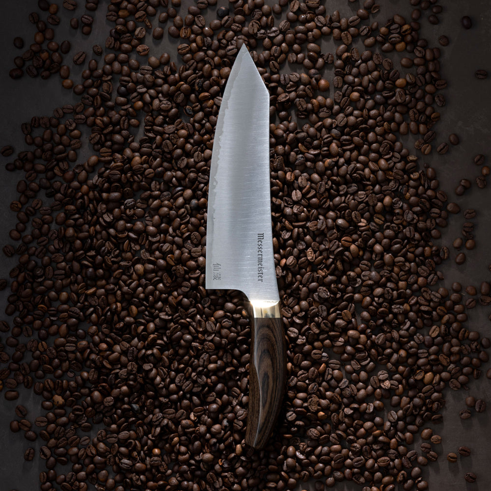 Messermeister Kawashima Chef's Knife on bed of coffee beans