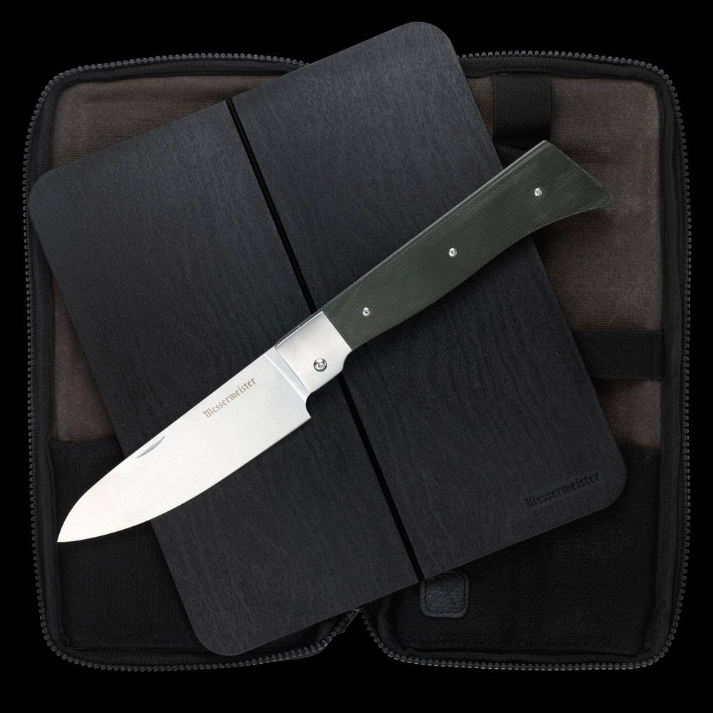Messermeister Adventure Chef Linen Basecamp Set 3 Piece set with the 6 inch folding Chef's Knife, faux wood cutting board, and zippered carrying case