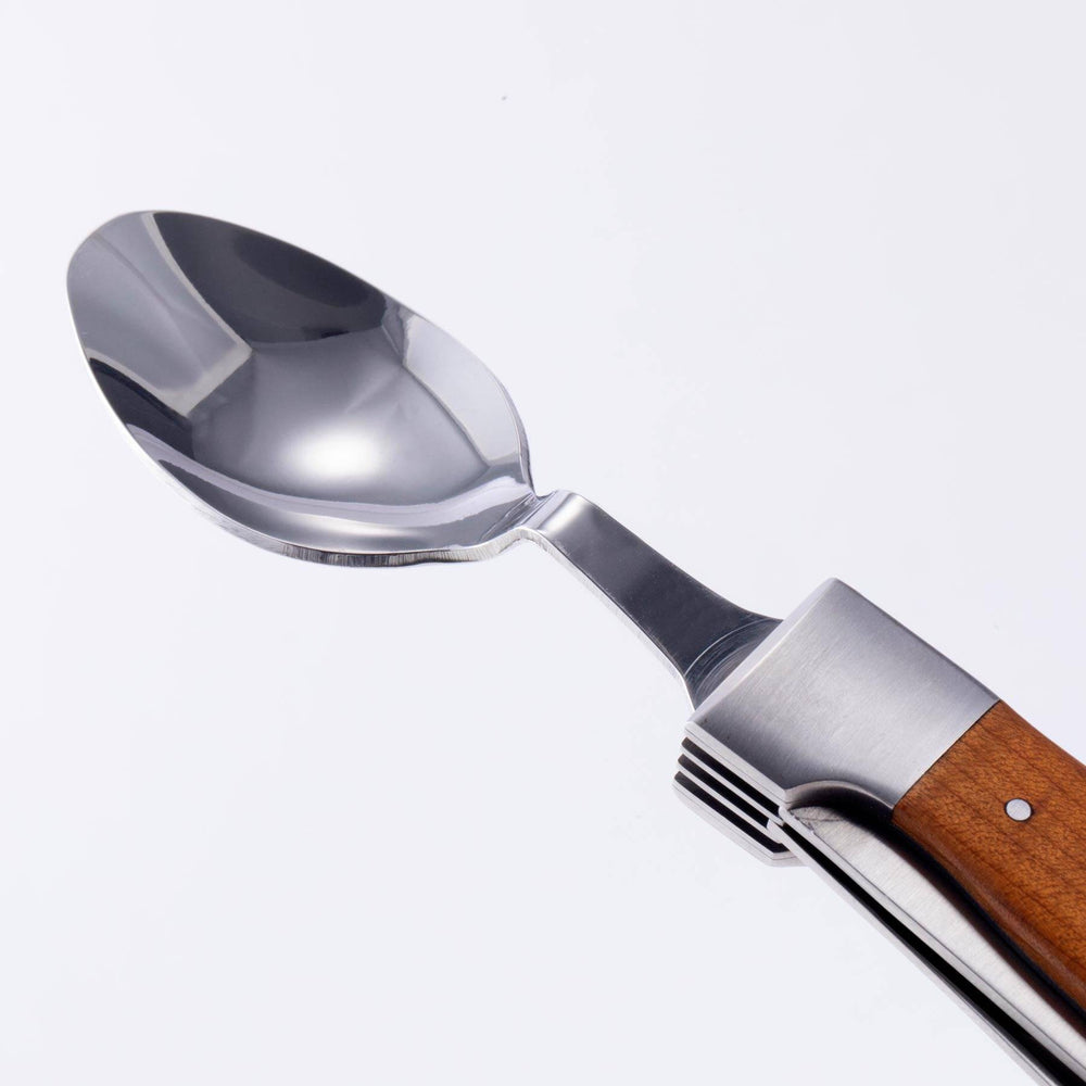 A close up view of the spoon on the Messermeister Adventure Chef Maple Folding Camp Utensil.