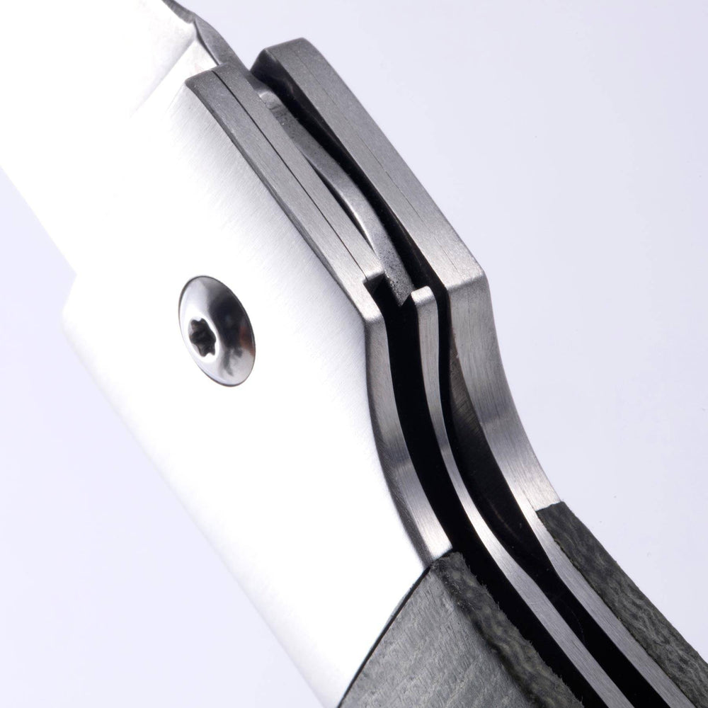 A close up view of the locking mechanism on the Messermeister Adventure Chef Folding 6 inch Fillet Knife 