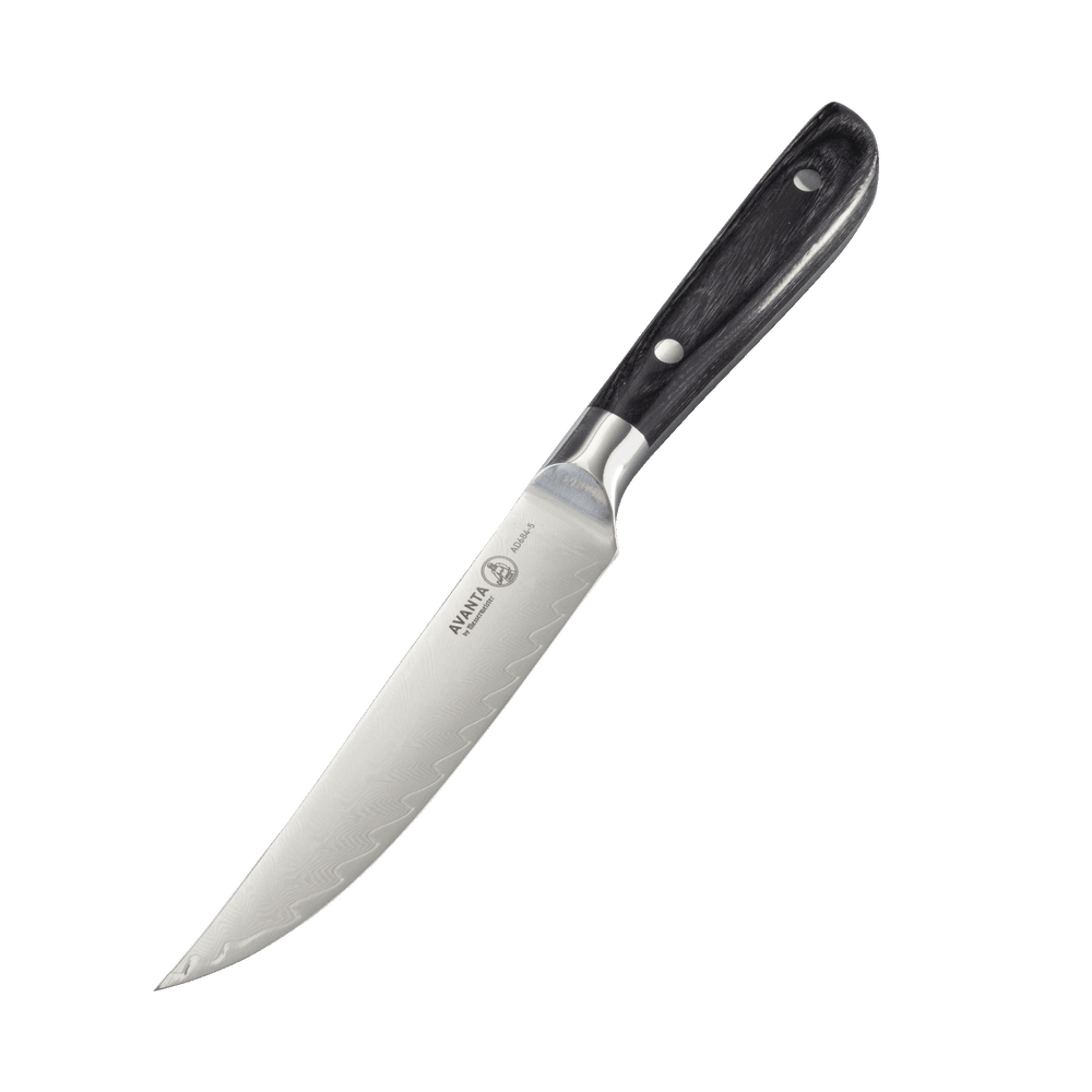 Angled view of Messermeister Avanta Damascus steak knife set showing blade edge and fishbone Damascus pattern