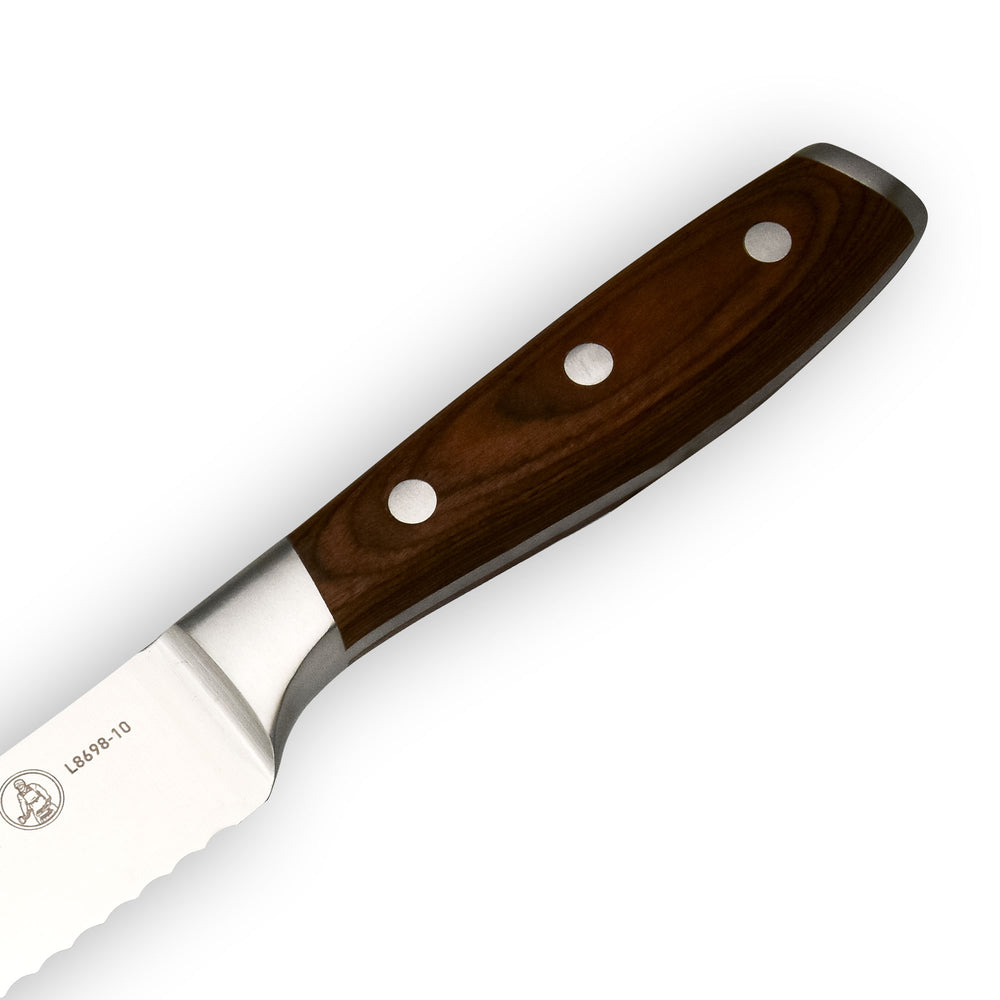 Messermeister Avanta scalloped slicing knife handle close-up showing pakkawood grain