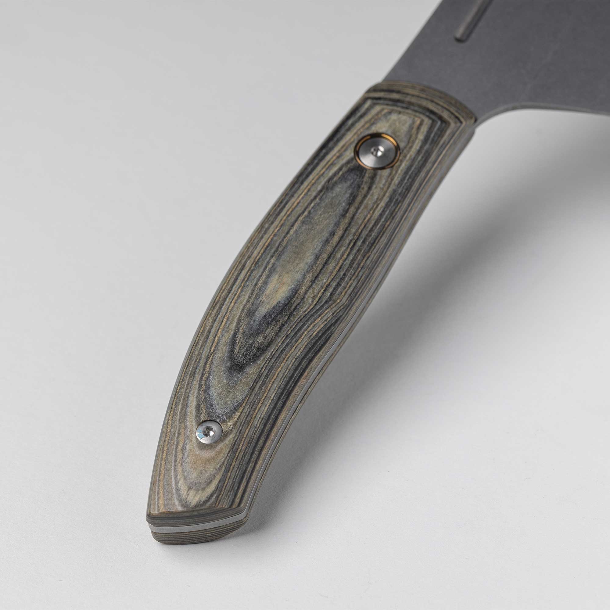 A close up view of the Spanish hardwood handle on the 8 inch Carbon Bunka Chef's Knife  