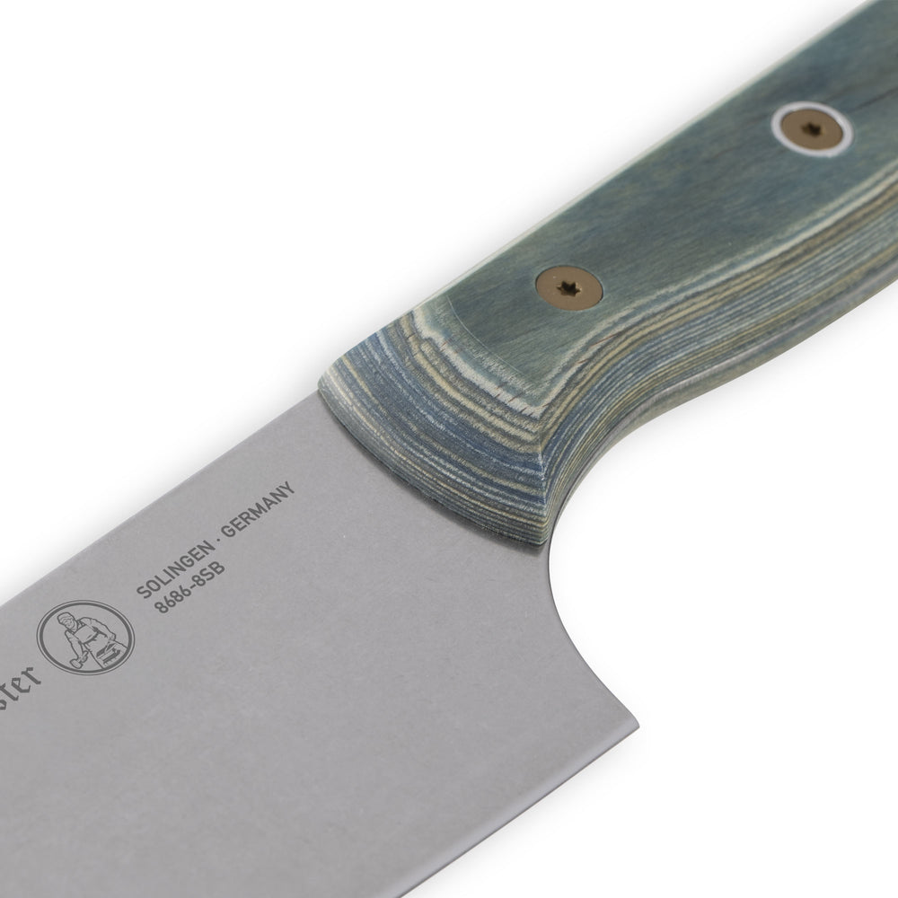 Detail view of Messermeister Custom Blue 8-inch chef’s knife showing heel and blue handle texture