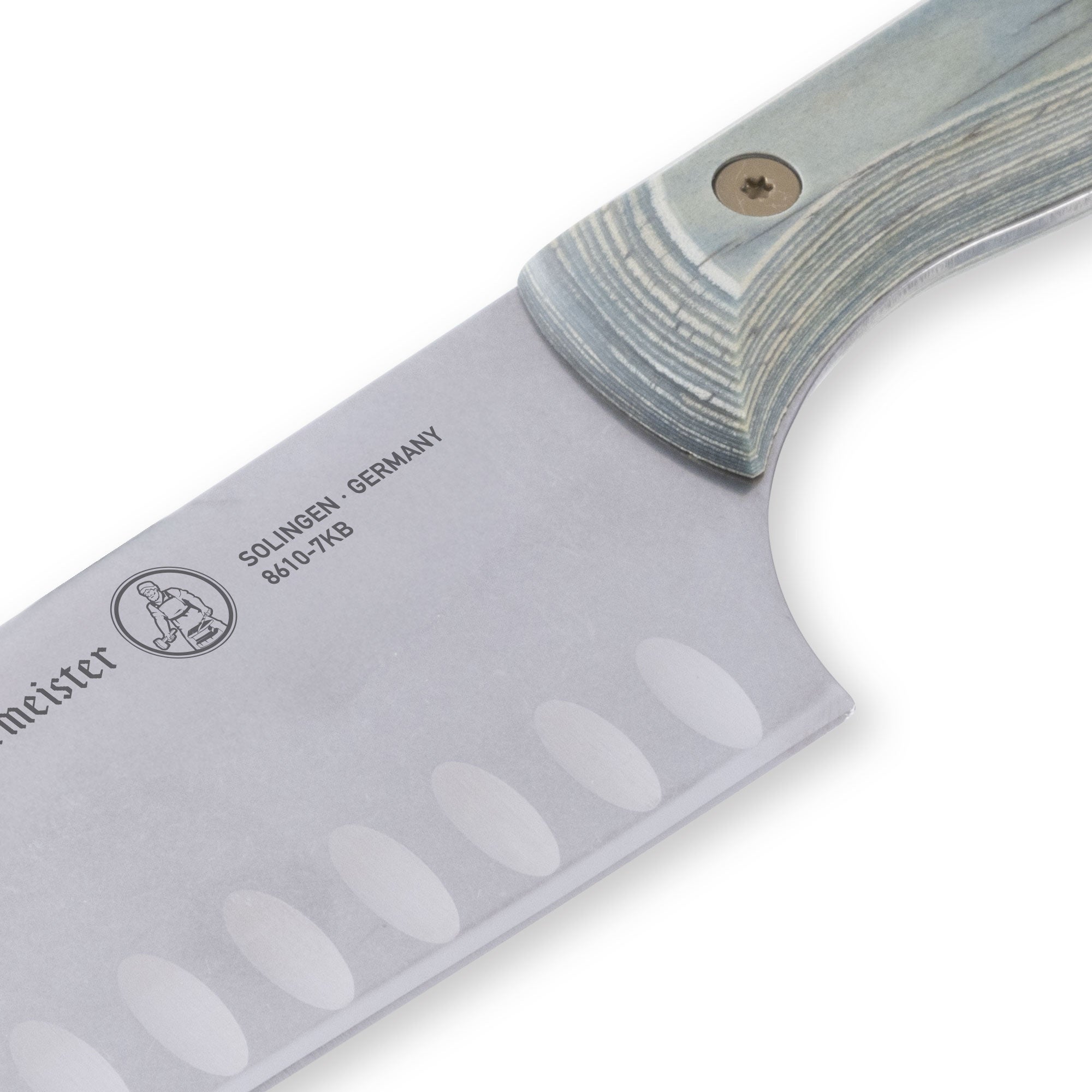 Close-up of Messermeister Custom Blue 7-inch santoku knife heel highlighting blade base and granton stainless steel edge