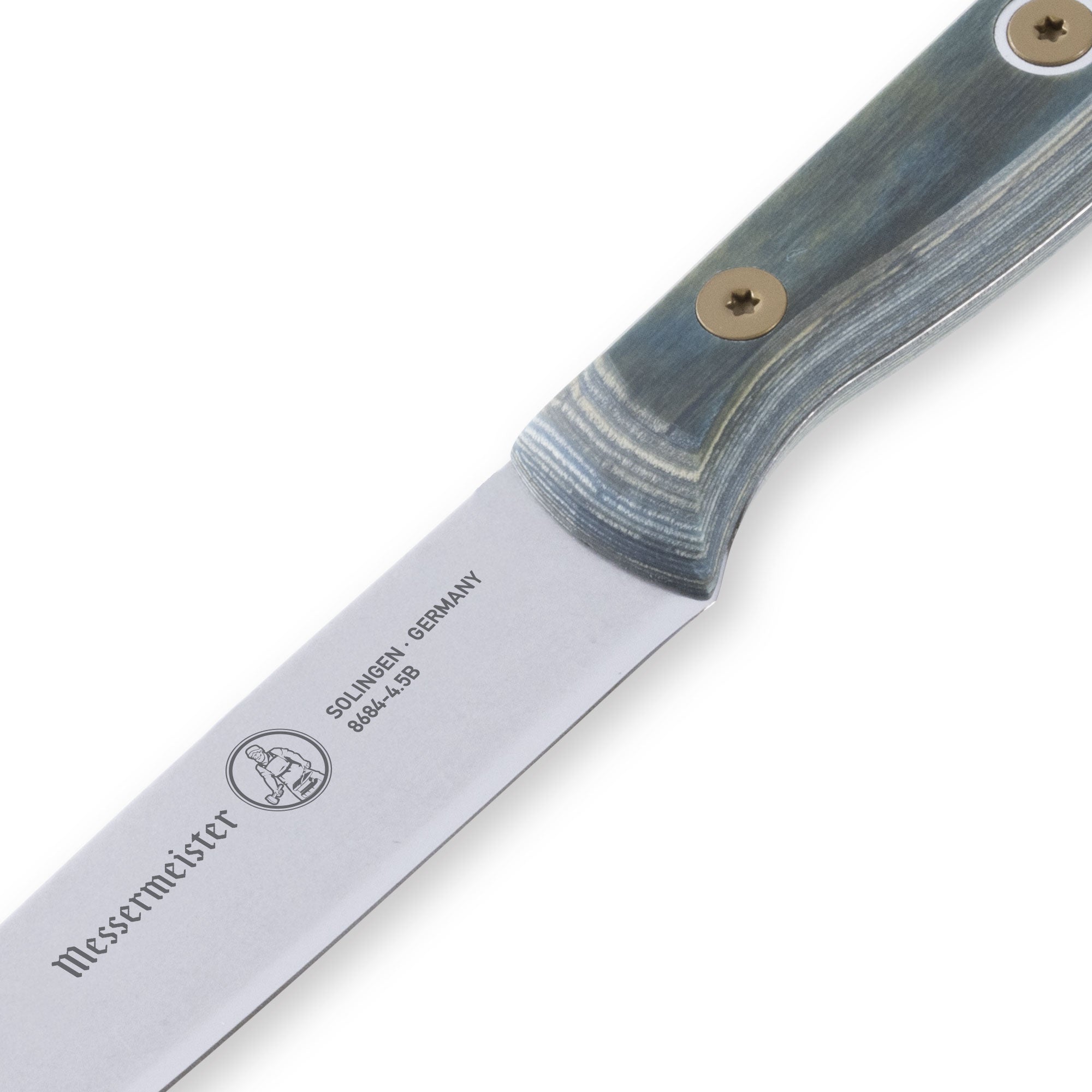 Close-up view of the heel area on a Messermeister Custom Blue 5-inch steak knife, highlighting the precision-forged stainless steel blade, smooth transition from blade to handle, and textured custom blue handle scales with premium craftsmanship details.