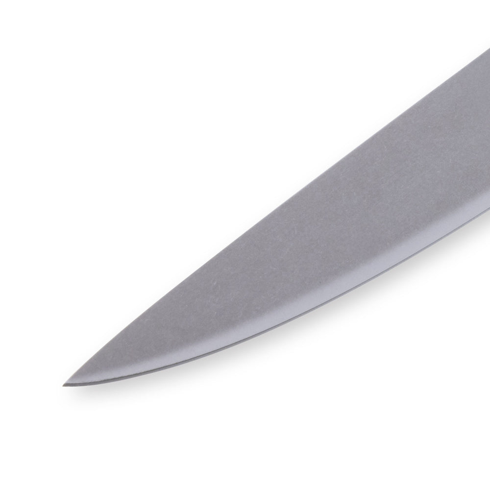 Close-up of Messermeister Custom Blue 6-inch utility knife tip highlighting sharp stainless steel cutting edge and precision point