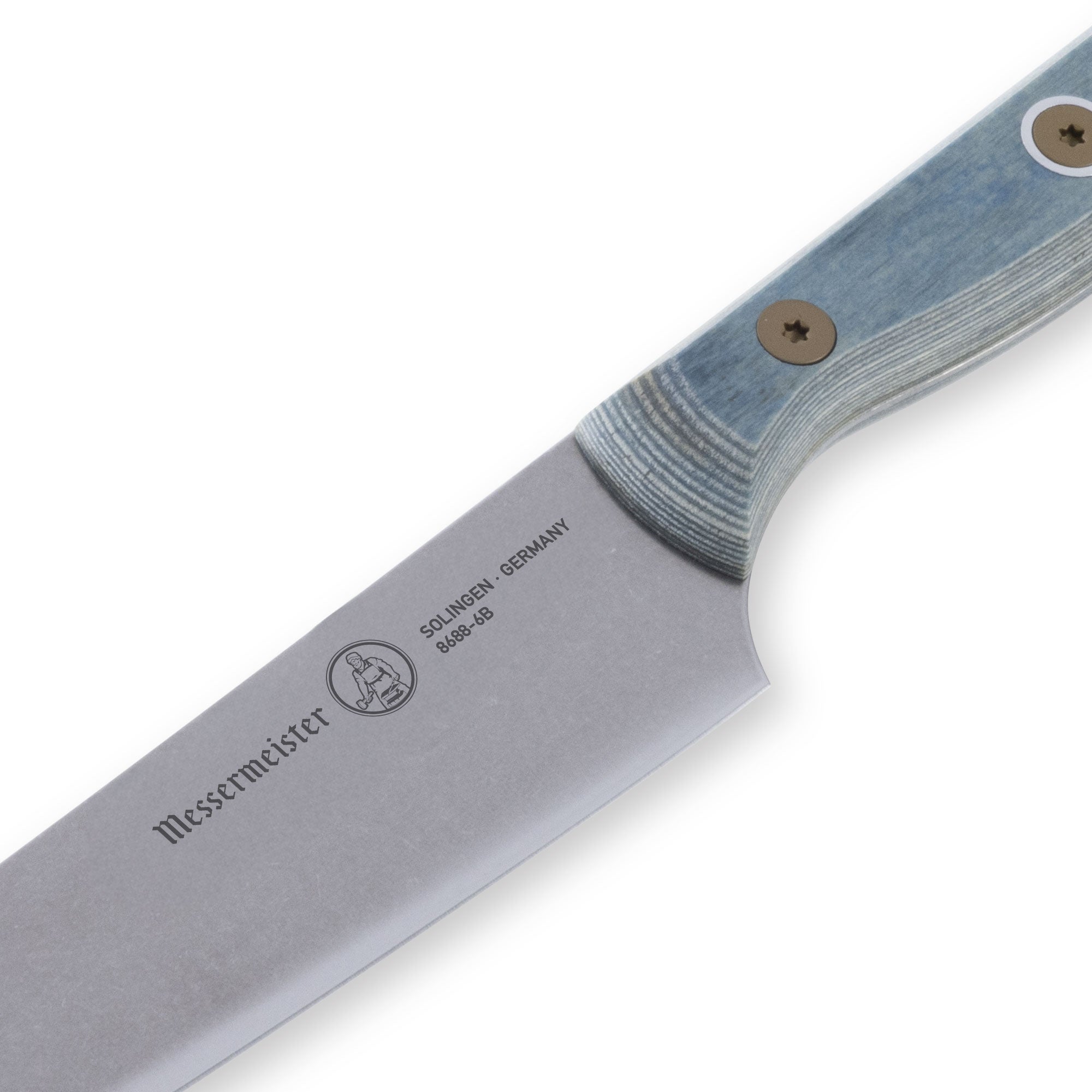 Detail view of Messermeister Custom Blue 6-inch utility knife heel showing stainless steel blade and transition to blue handle