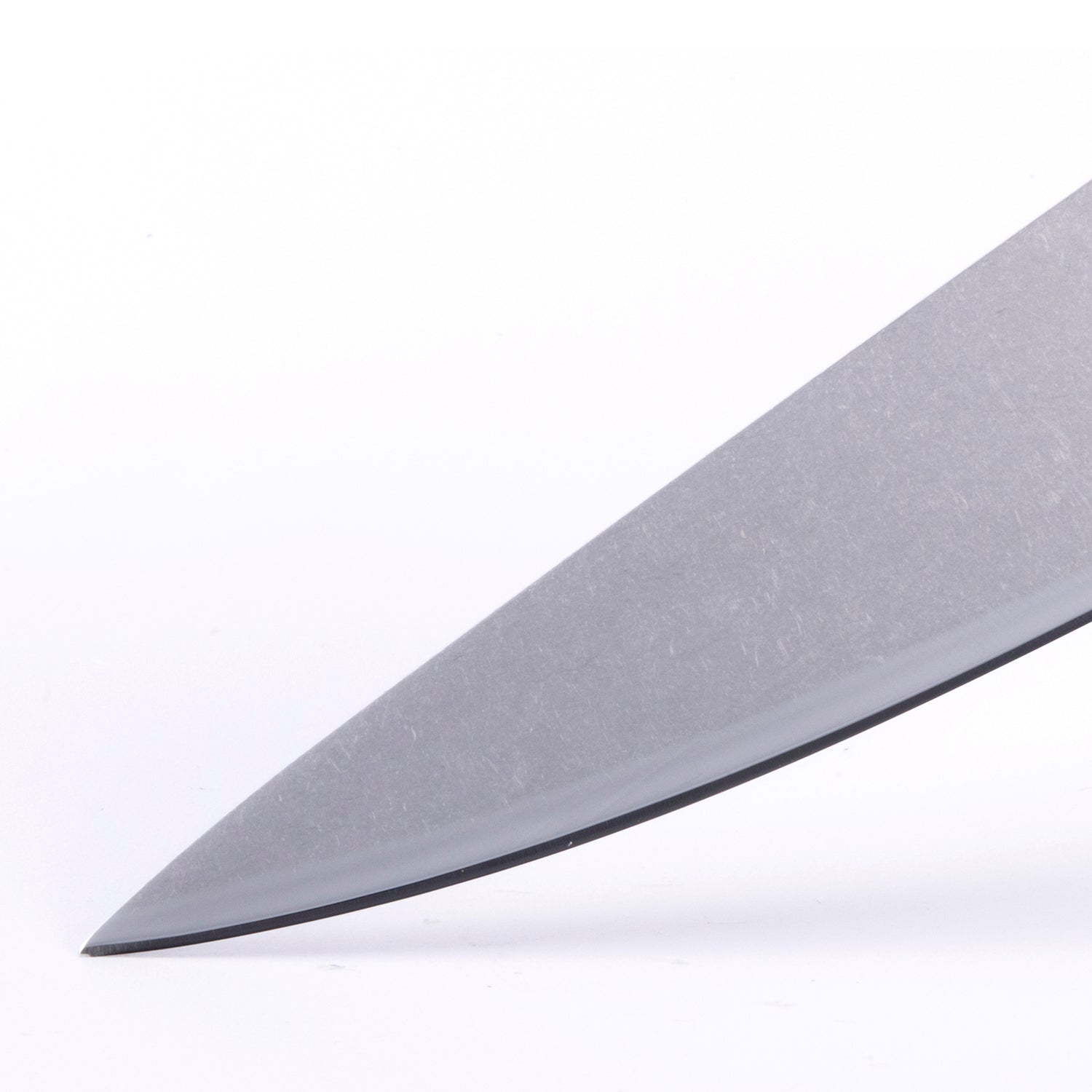 Detail of Messermeister custom utility knife blade showing sharp precision edge and polished steel