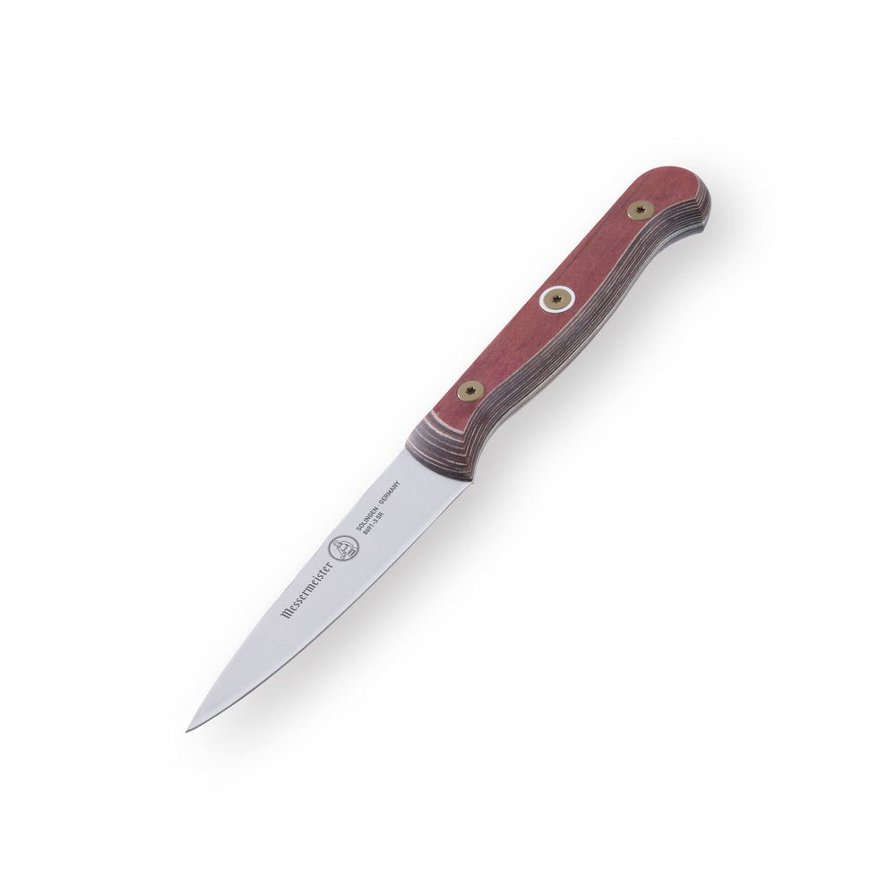 Angled-down view of the Messermeister Custom Red 3.5-inch Paring Knife showing precision stainless steel blade and ergonomic red handle for controlled detail cutting