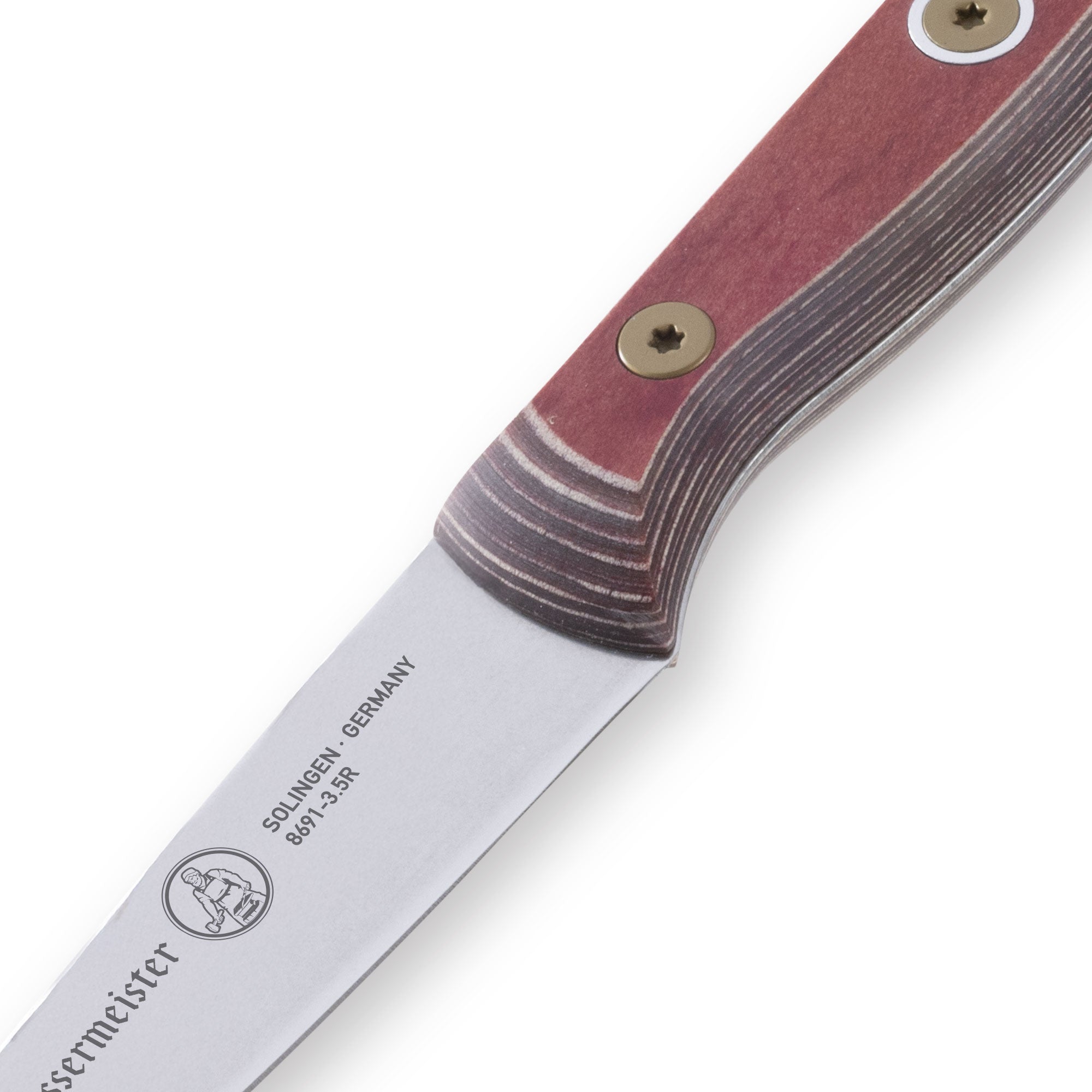 Close-up of the heel of the Messermeister Custom Red 3.5-inch Paring Knife showing the transition from ergonomic red handle to precision stainless steel blade edge