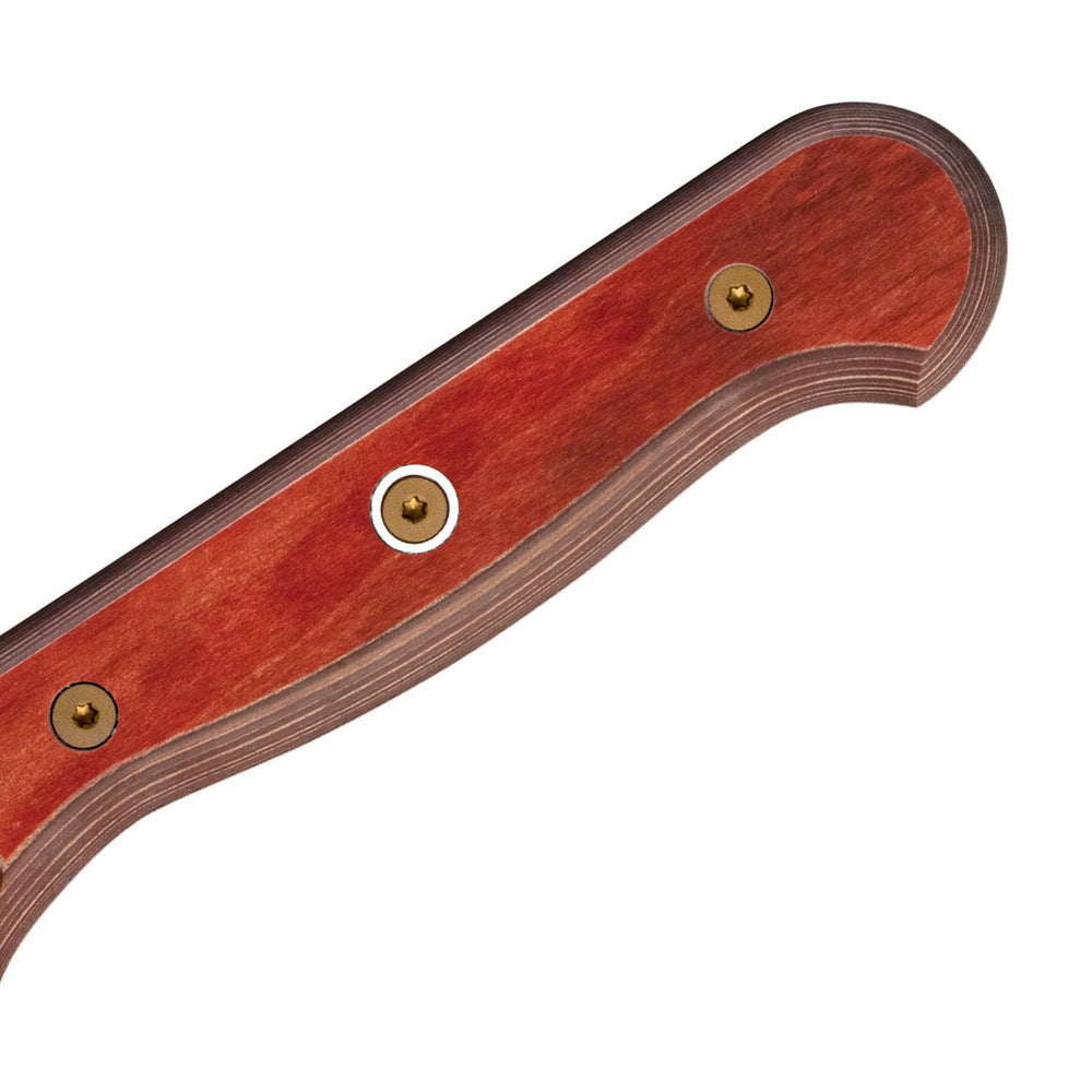 Close-up of the ergonomic red handle on the Messermeister Custom Red 3.5-inch Paring Knife, highlighting textured grip and seamless full-tang construction