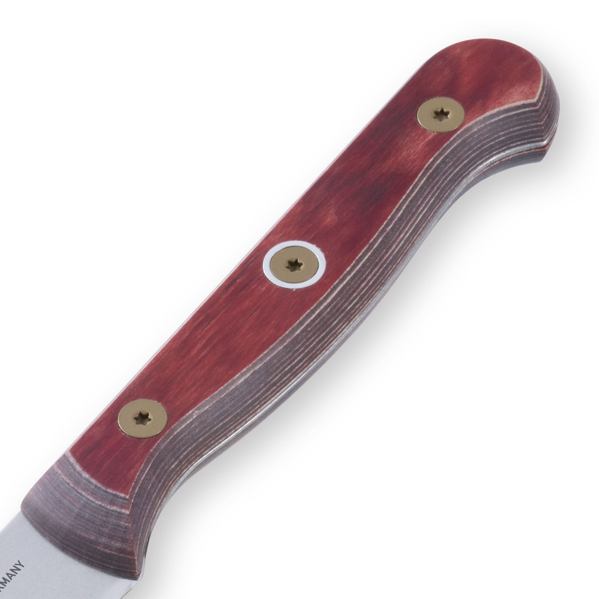 Close-up of the ergonomic red handle on the Messermeister Custom Red Steak Knife, showing textured grip, smooth finish, and full-tang construction detail