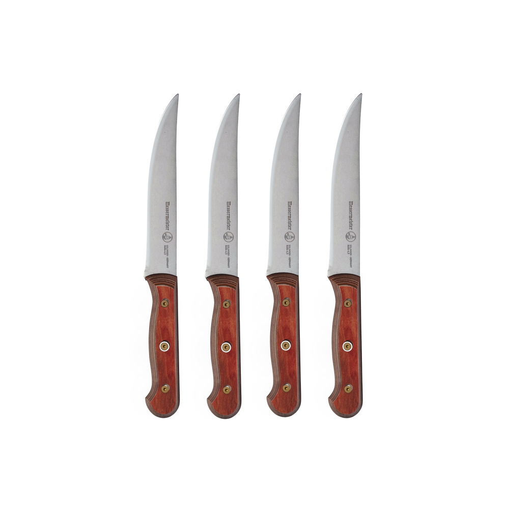 Messermeister Custom Red 4-Piece Steak Knife Set featuring 5-inch serrated stainless steel blades and ergonomic red handles, designed for smooth, precise cutting of meats