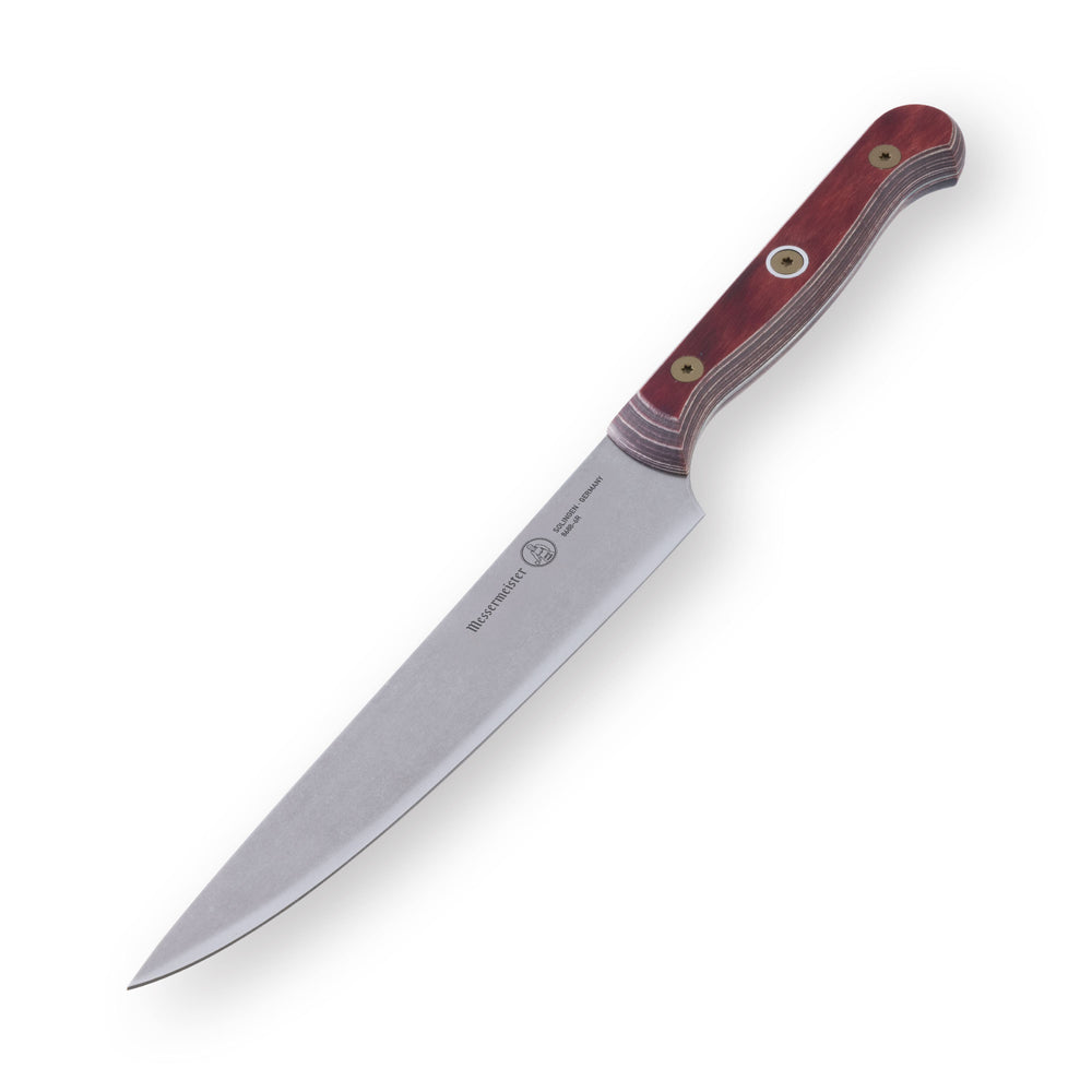 6-inch Messermeister Custom Red utility knife shown at a downward angle, highlighting the polished stainless steel blade and bold red ergonomic handle