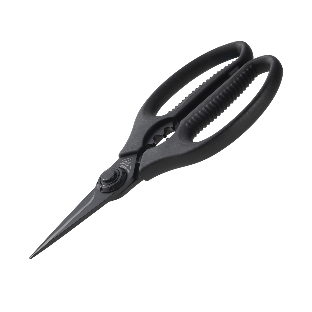 Esther Choi 7-inch push button take-apart precision shears angled downward featuring stainless steel precision blades, ergonomic handles, and a detachable design for precise kitchen prep and easy cleaning