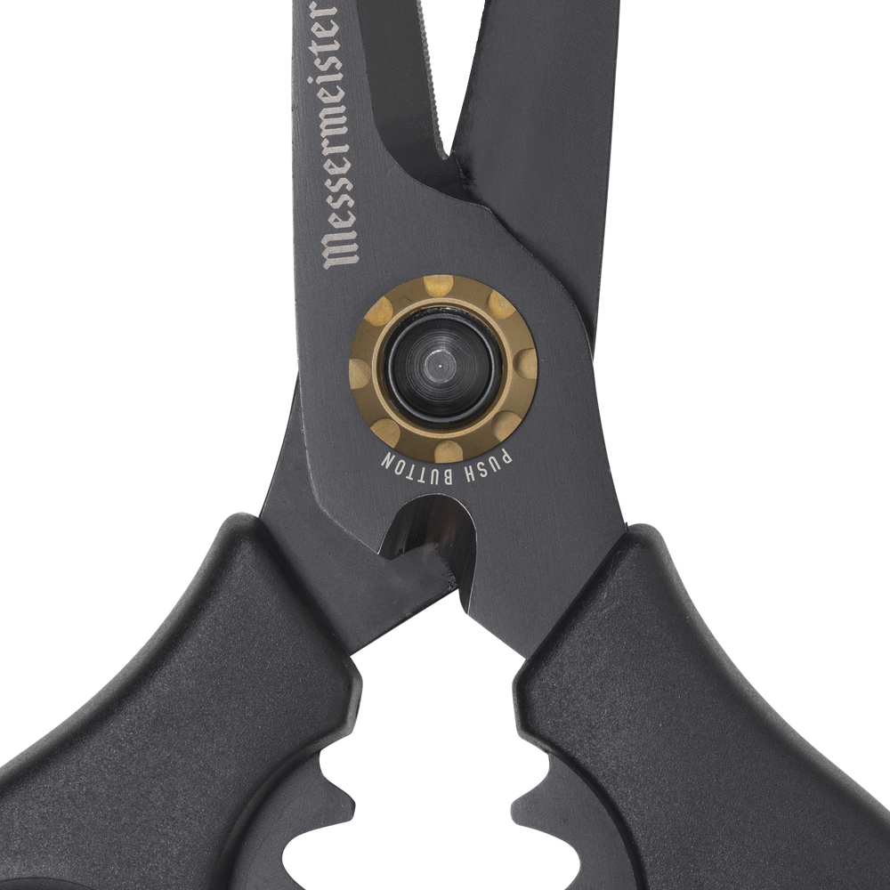 Esther Choi 7-inch push button take-apart precision shears close-up of the push button release mechanism, highlighting stainless steel construction, precision engineering, and detachable design for easy disassembly and cleaning