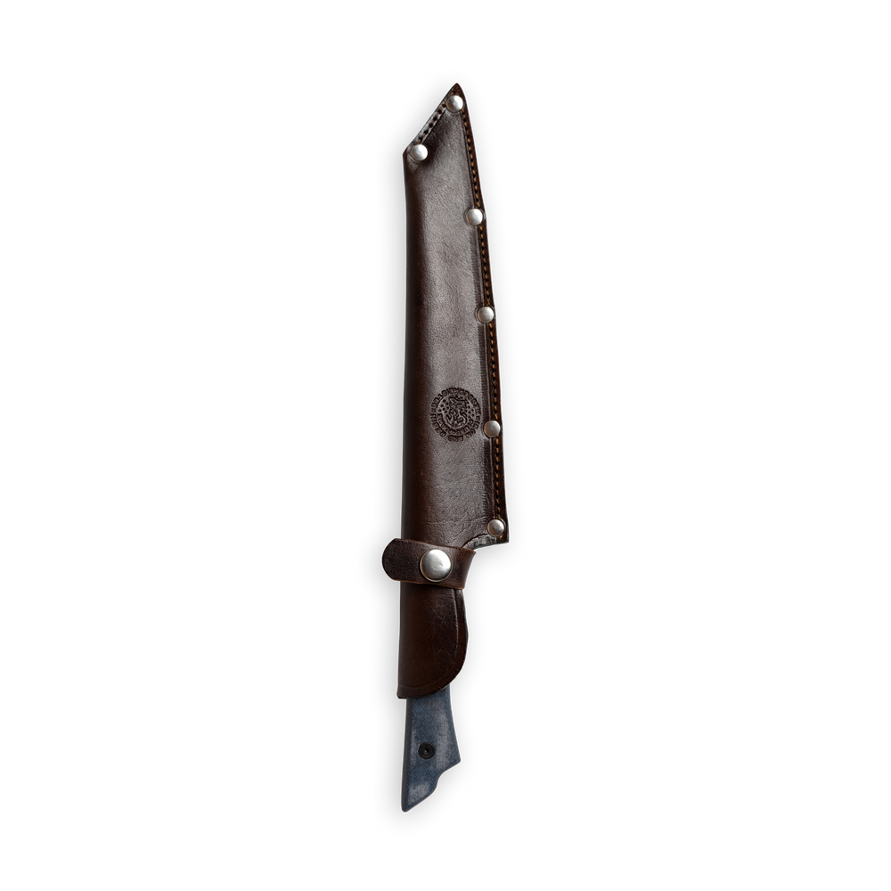 INR x Messermeister Slicer 9 inch inside leather sheath on a plain background