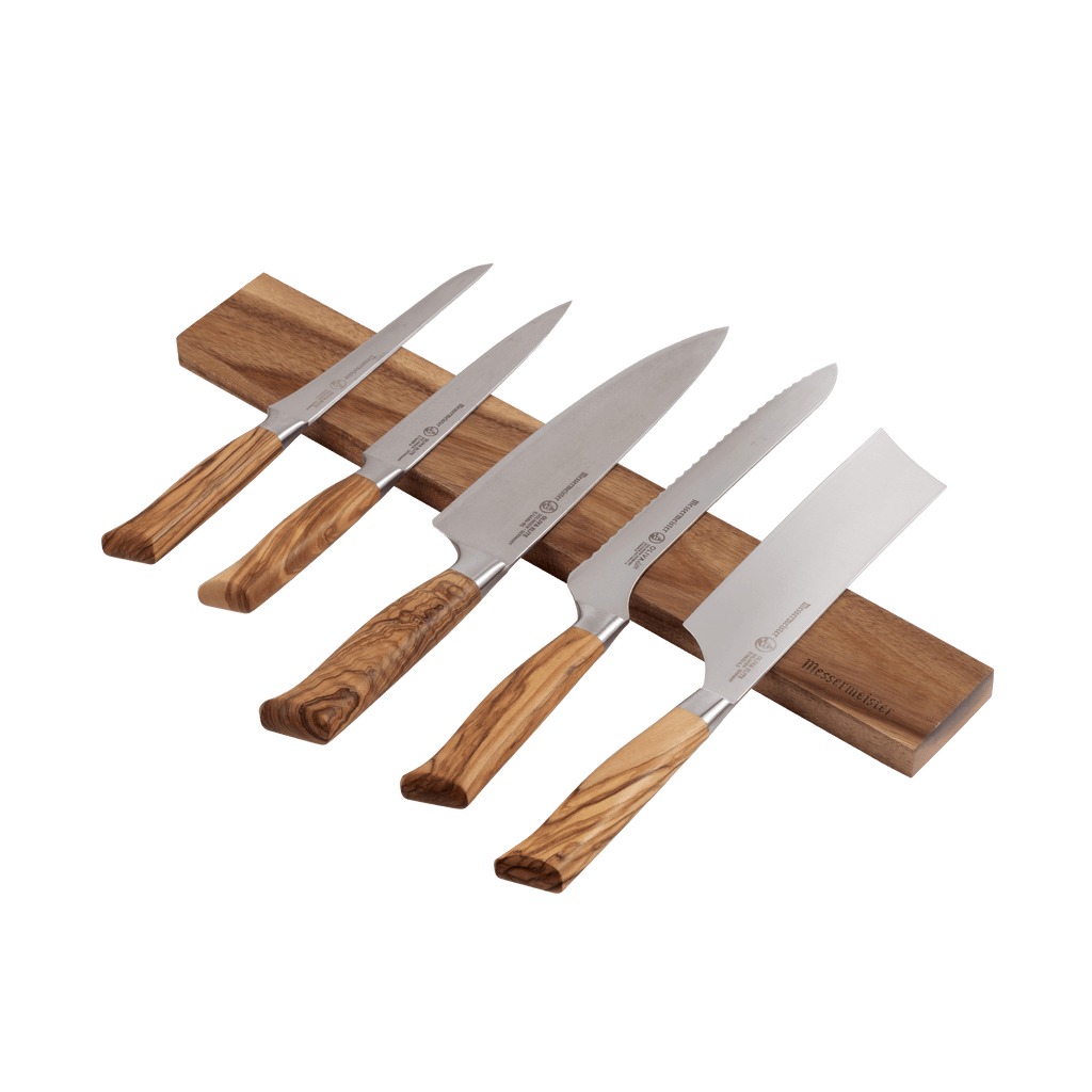 Messermeister Acacia Knife Magnet Bar with 5 wood handles knives resting along the bar.