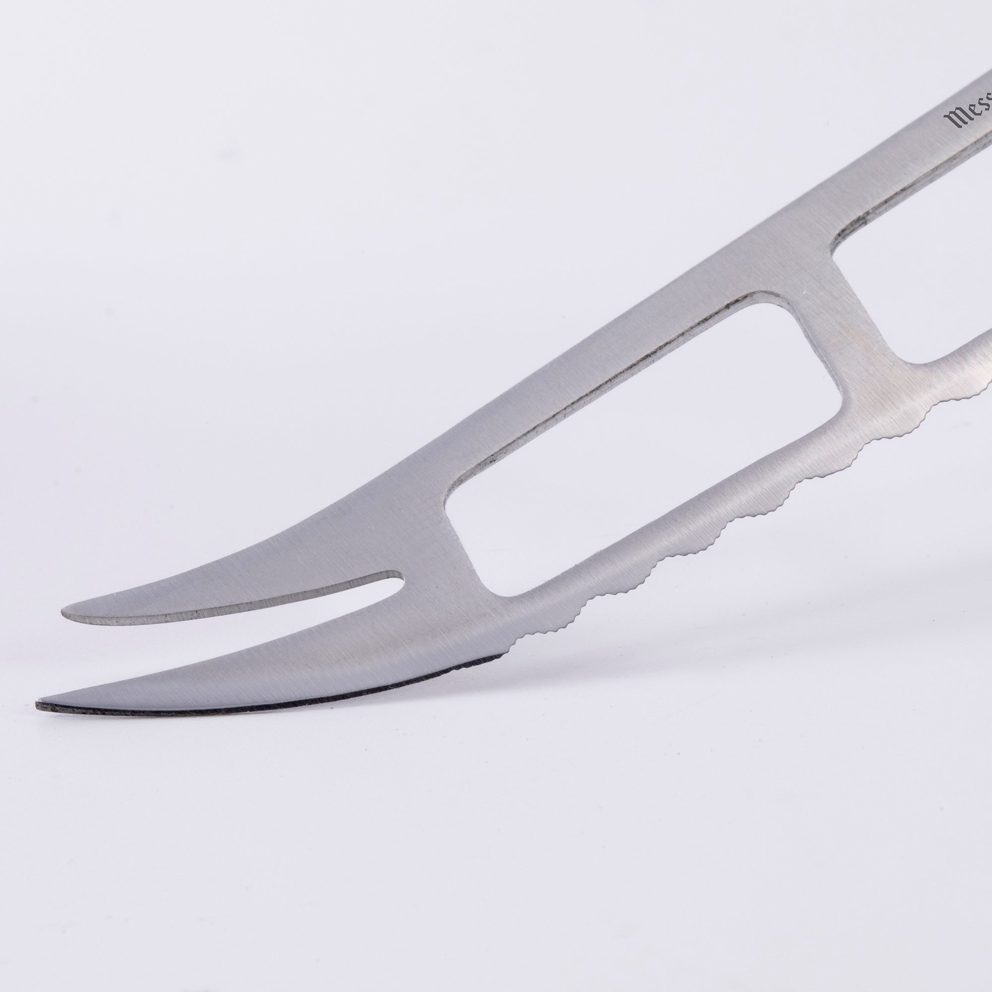 Meridian Elite Cheese and Tomato Knife up close view of the Fork Tip on a white background