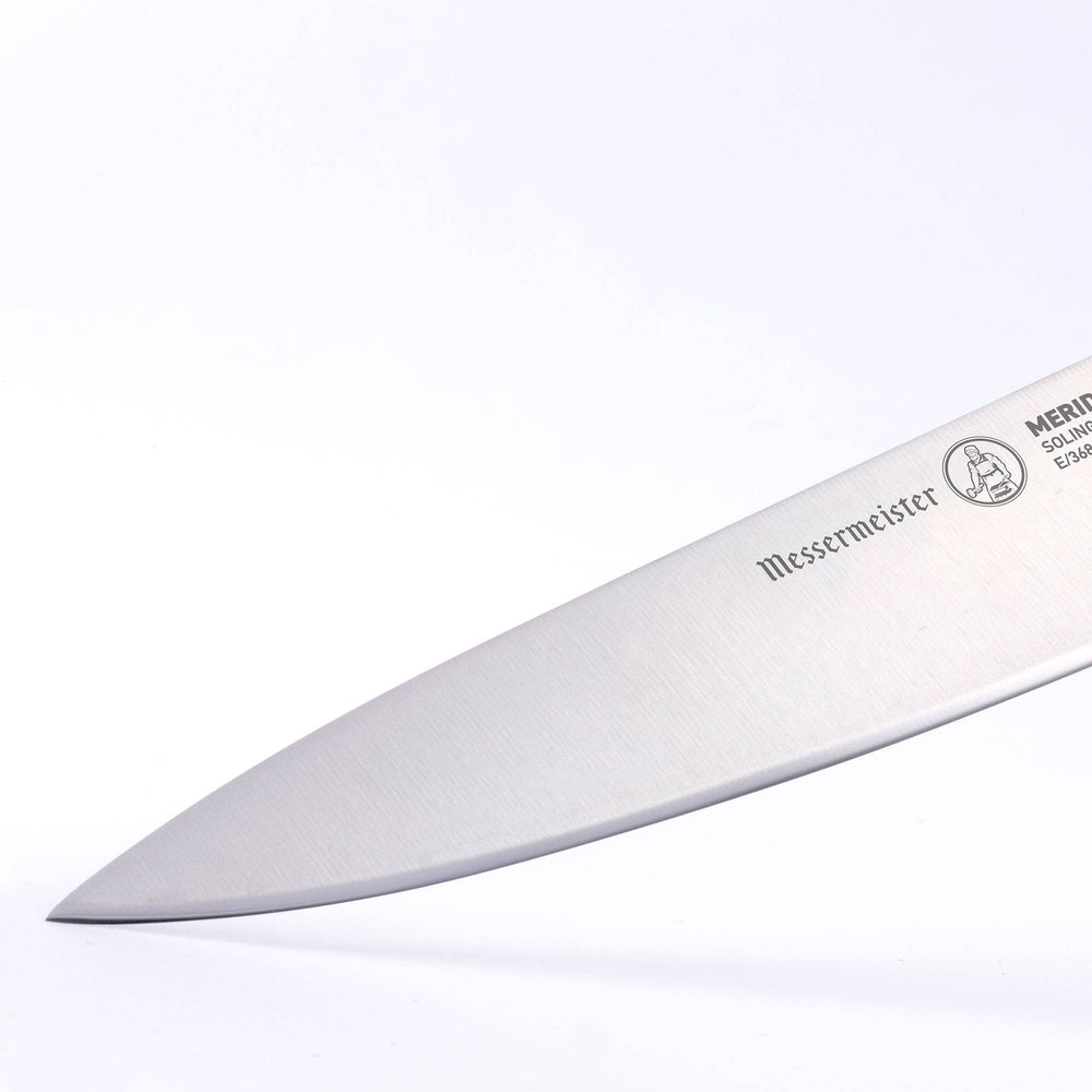 The Meridian Elite Chef's Knife 10 inch close up photo of knife blade and tip