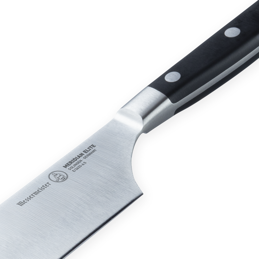 Messermeister Meridian Elite Nakiri Knife with black handle highlighting the heel tip