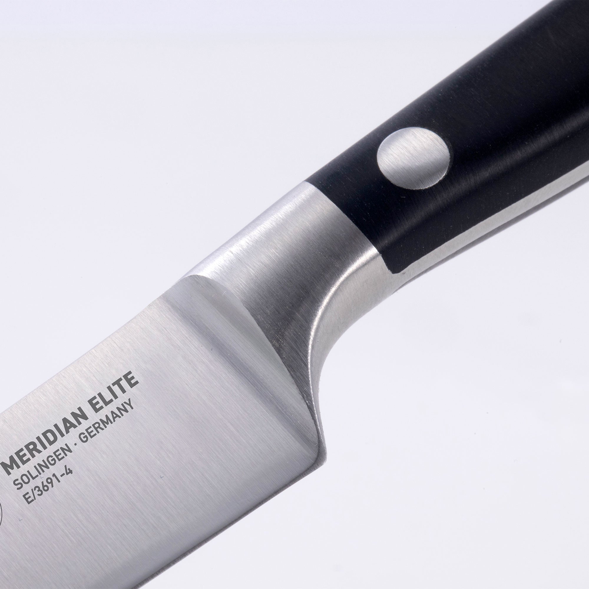 Messermeister Meridian Elite Spear Point Paring Knife close up photo of bolster and heel
