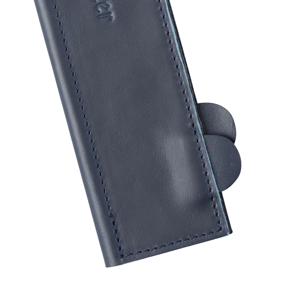 Messermeister 10.5 inch Midnight Navy Leather Magnetic Edge Guard Soft Rubber Magnets for a Gentle Grip close up on nubs for opening