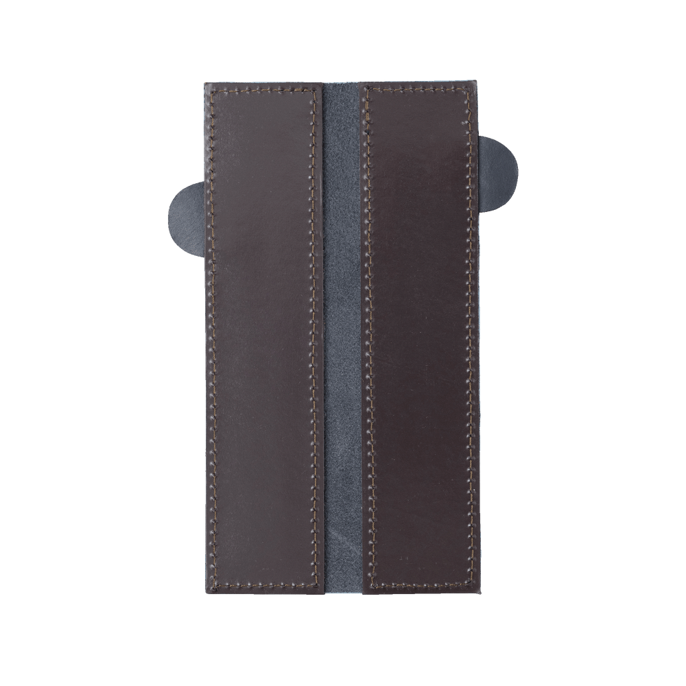 Messermeister 6.5 inch Midnight Navy Leather Magnetic Edge Guard Soft Rubber Magnets For a Gentle Grip opened to show magnets 