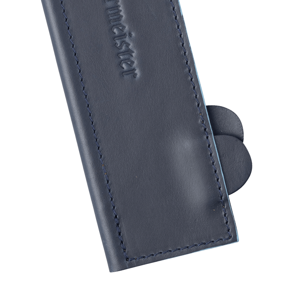 Messermeister 8.5 inch Midnight Navy Leather Magnetic Edge Guard Soft Rubber Magnets For a Gentle Grip close up on raised ridged 