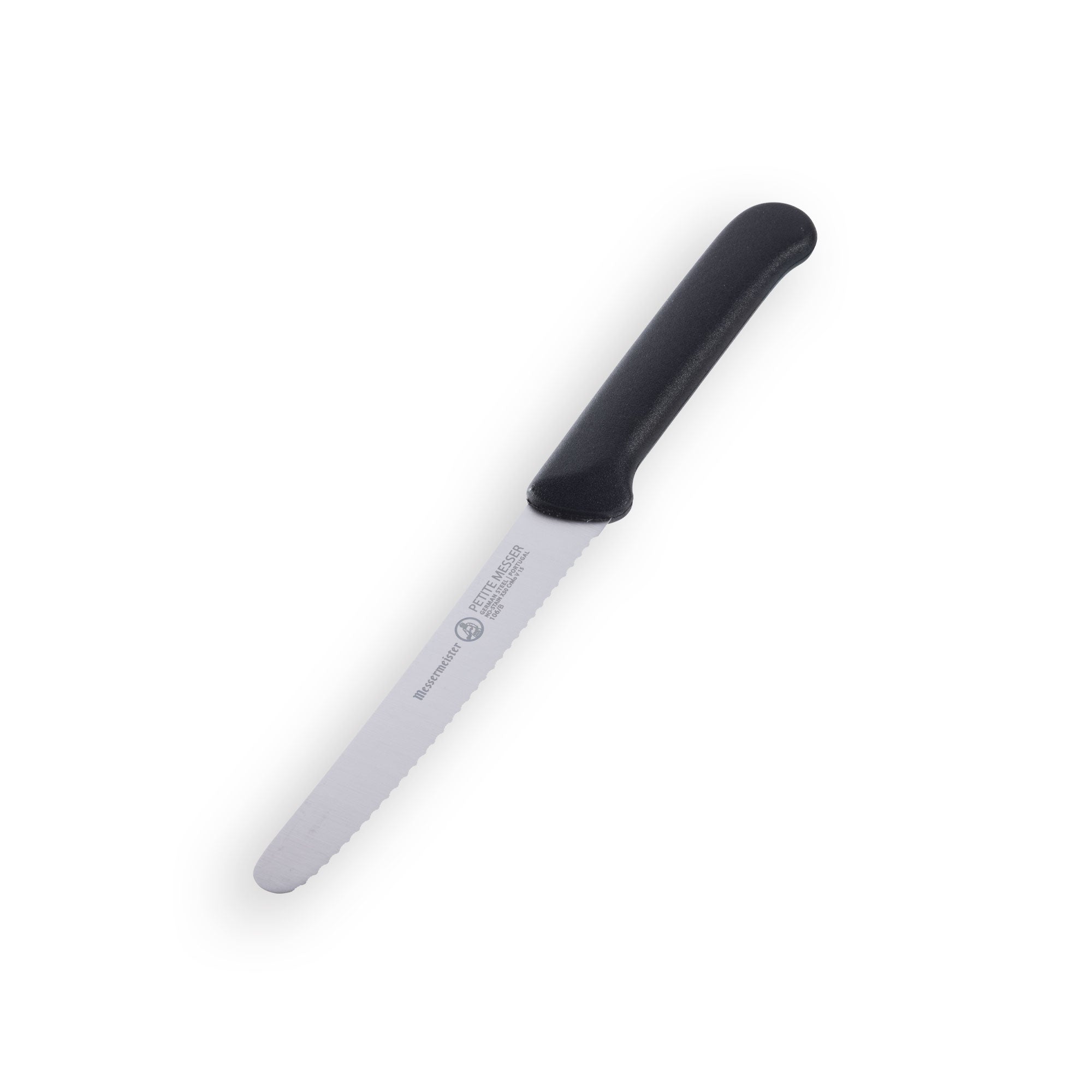 Angled view of 4.5-inch black serrated tomato knife showing stainless steel blade and ergonomic handle, no sheath
