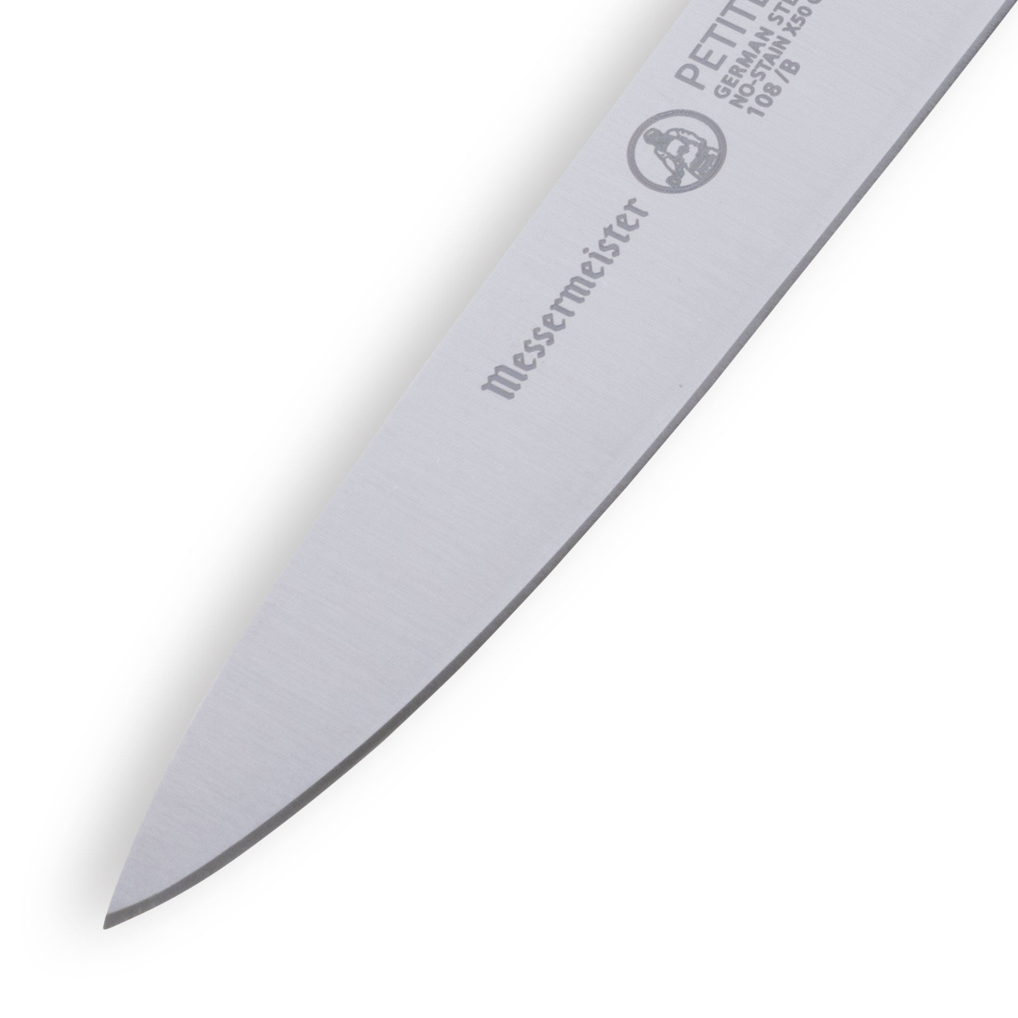 Micro view of  Messermeister Petite Messer Black spear point paring knife blade highlighting sharp cutting edge