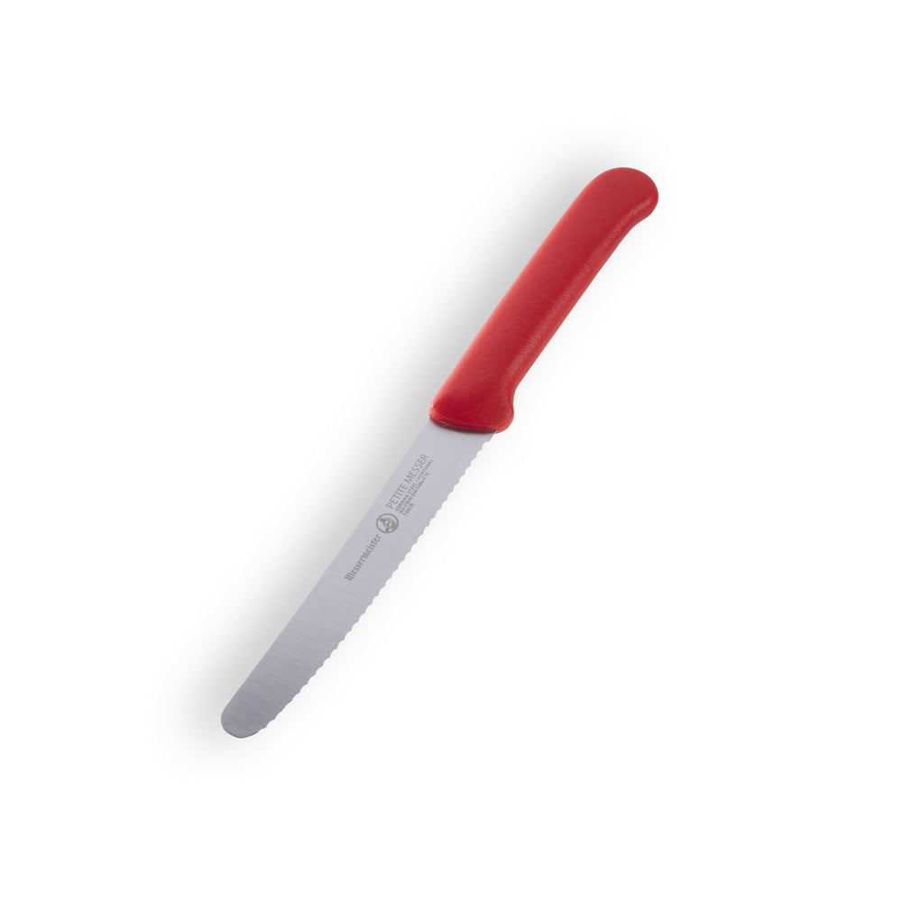 Close angled view of Messermeister Petite Messer red serrated tomato knife with stainless steel serrated blade and red handle