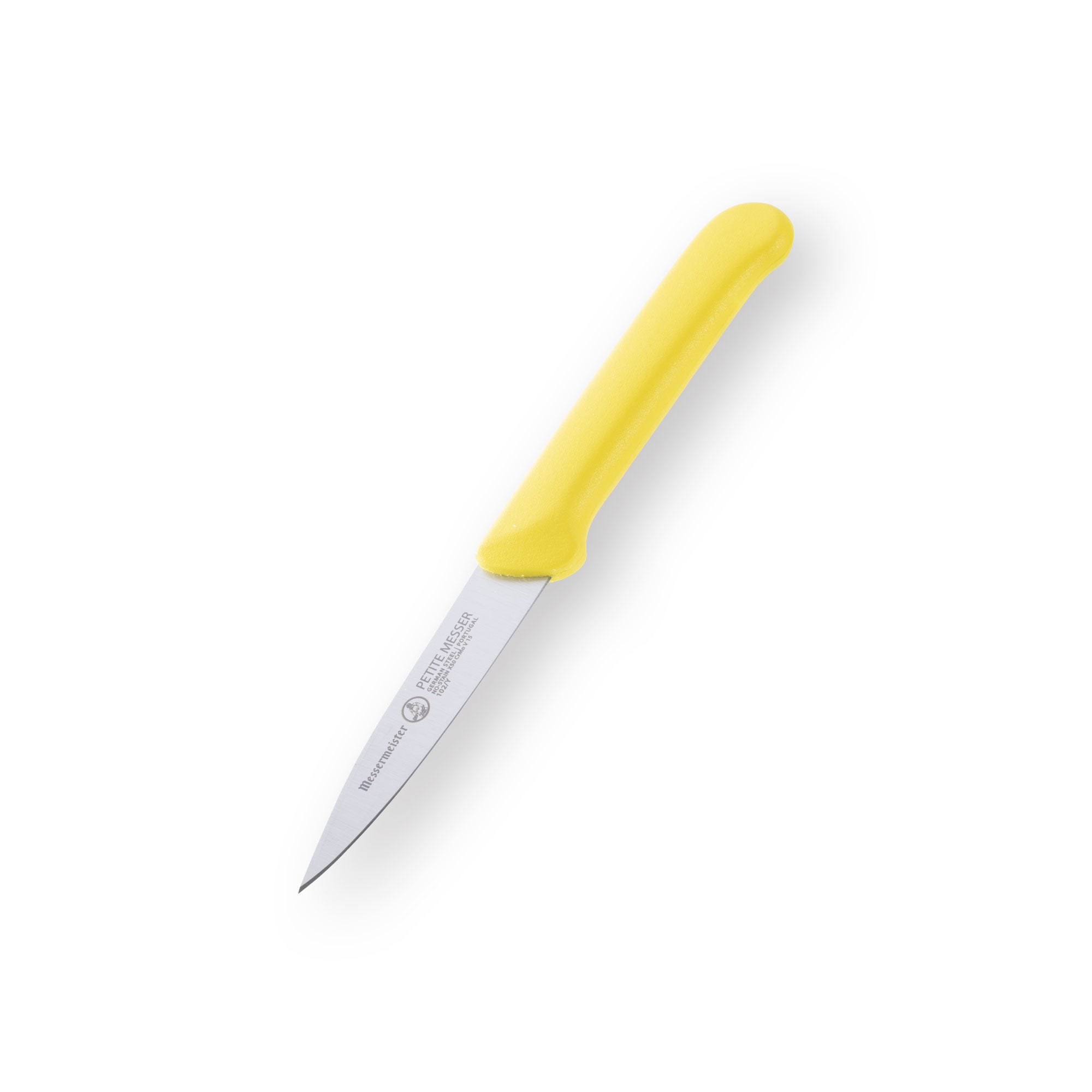 Messermeister Petite Messer 3 inch yellow spear point paring knife angled down view highlighting precision blade