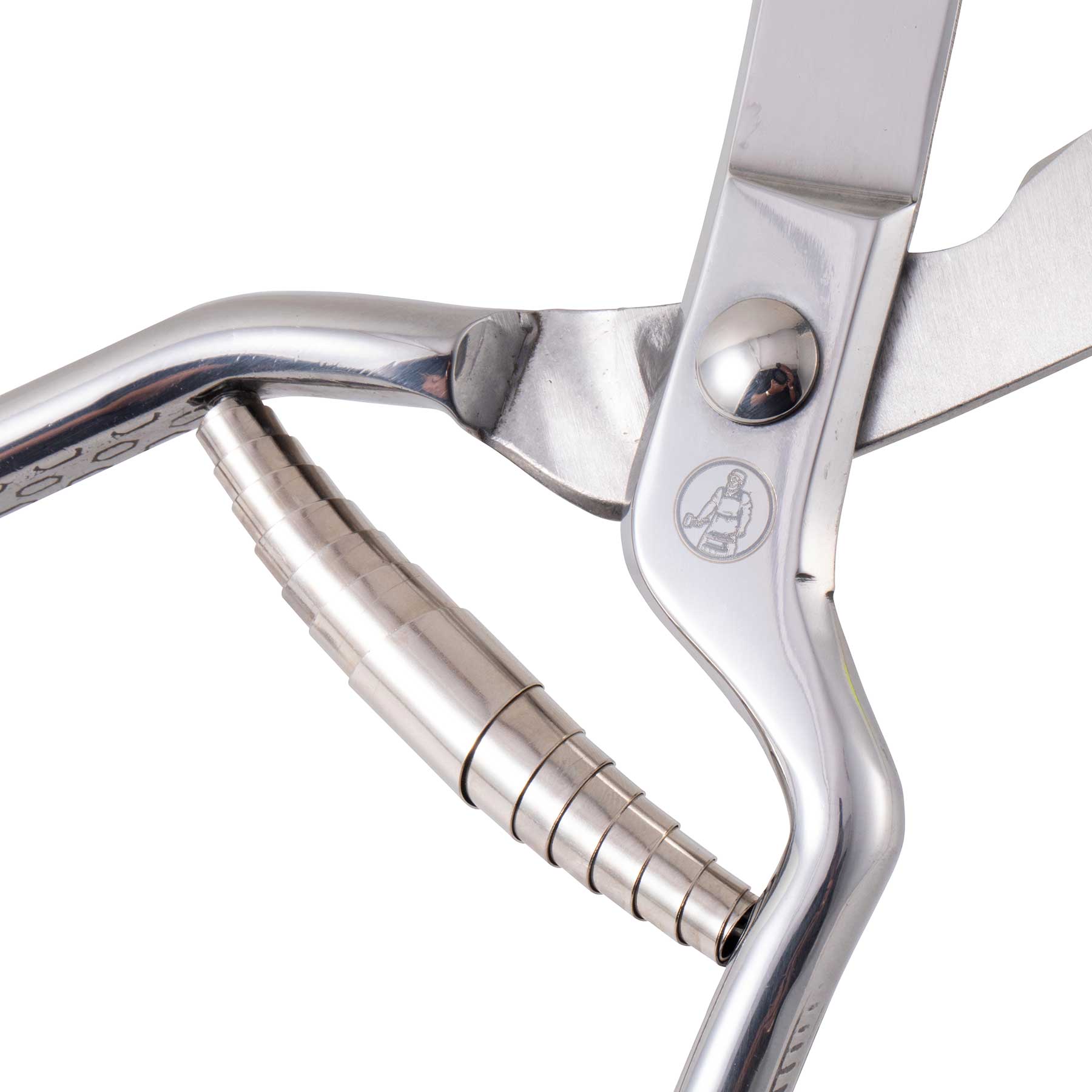 Close-up of the spring mechanism on Messermeister 10-inch poultry shears, showcasing the tensioned stainless steel spring designed for smooth opening action, controlled cutting, and durable long-term kitchen use
