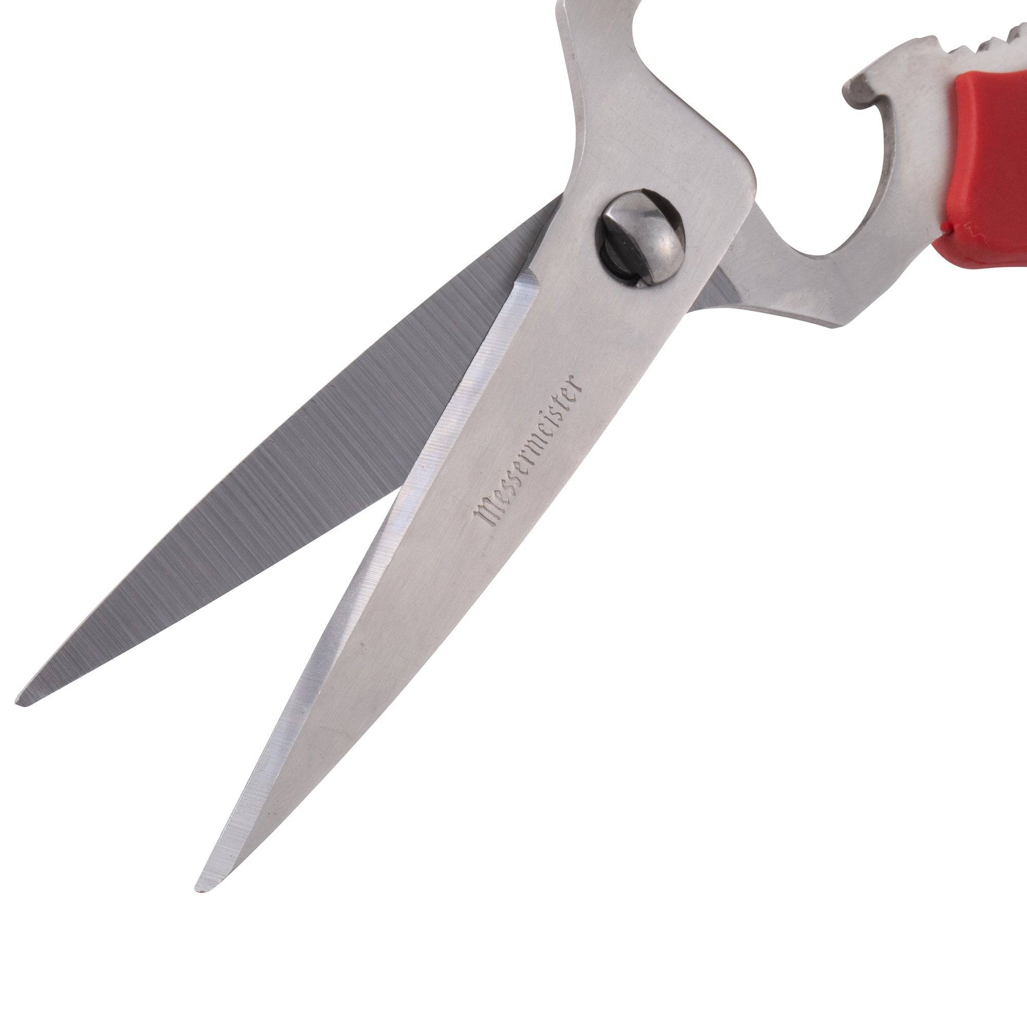 Close-up of the stainless steel scissor blades on Messermeister take-apart kitchen scissors, showcasing sharp precision edges and durable construction designed for clean, efficient cutting in kitchen prep tasks