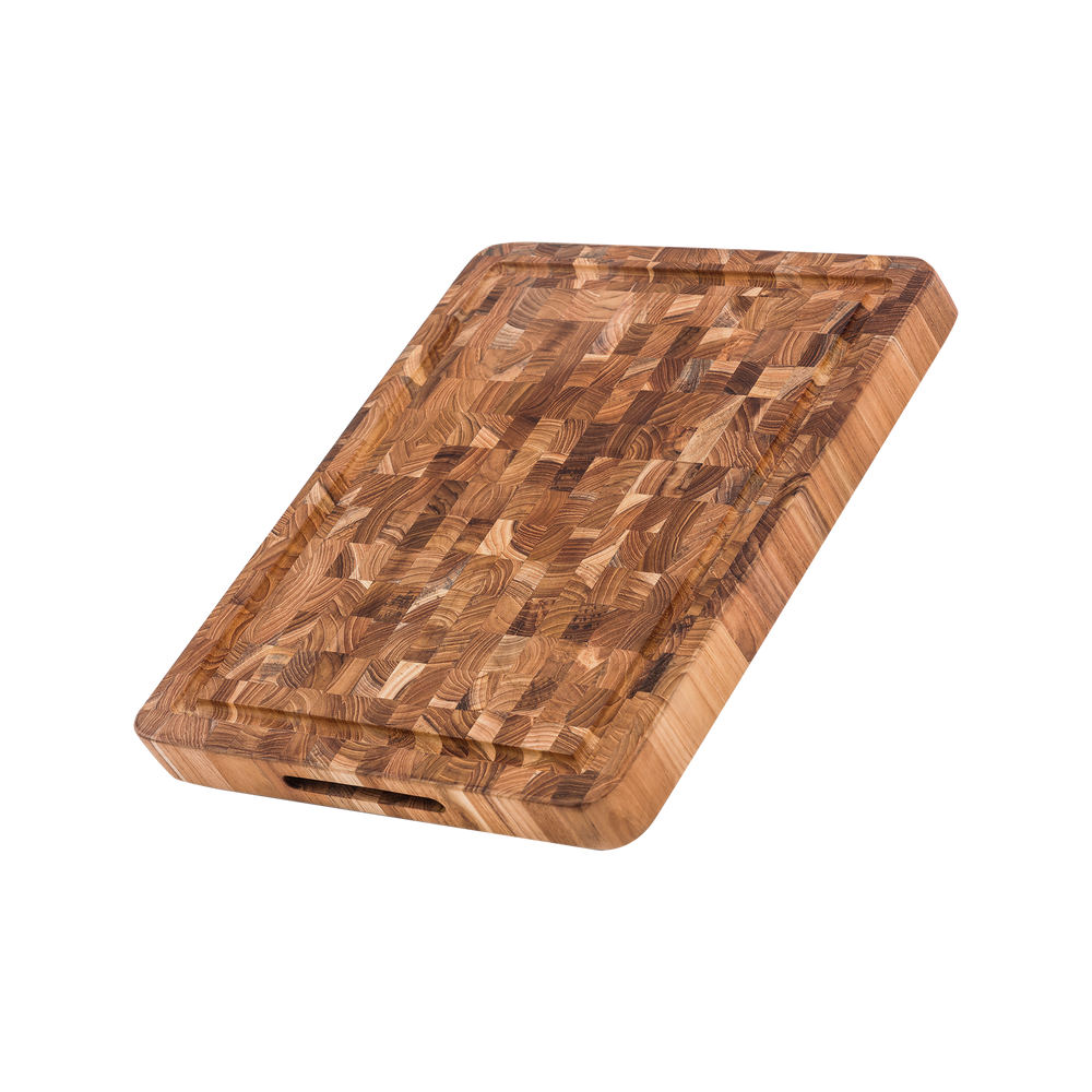 TeakHaus Butcher Block Carving Board, 16 x 12 inches, made from durable teak wood with a sturdy butcher block design for carving and serving meat shown angled down.
