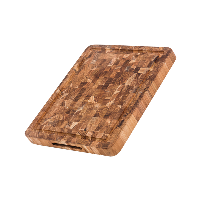 TeakHaus Butcher Block Carving Board, 16 x 12 inches, made from durable teak wood with a sturdy butcher block design for carving and serving meat shown angled down.