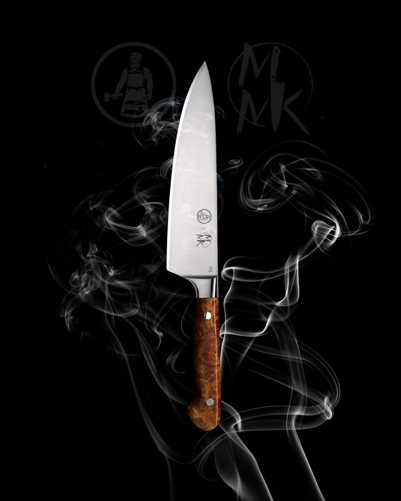 A chef's knife with a silver stainless steel blade and a brown wood-grain handle, centered against a black background with white smoke swirls and faint brand logos.