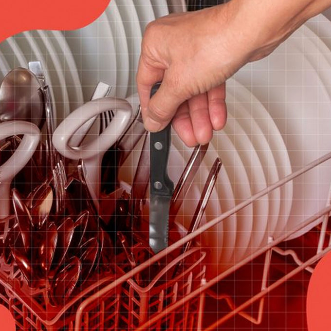Hand pulling a knife out of a dishwasher rack with a stylized background