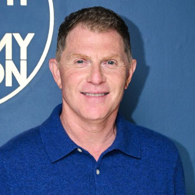 Chef Bobby Flay on blue background