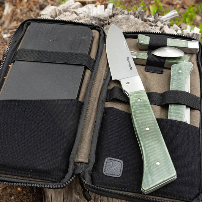 Messermeister Adventure Chef Linen Kit on wood stump outdoors