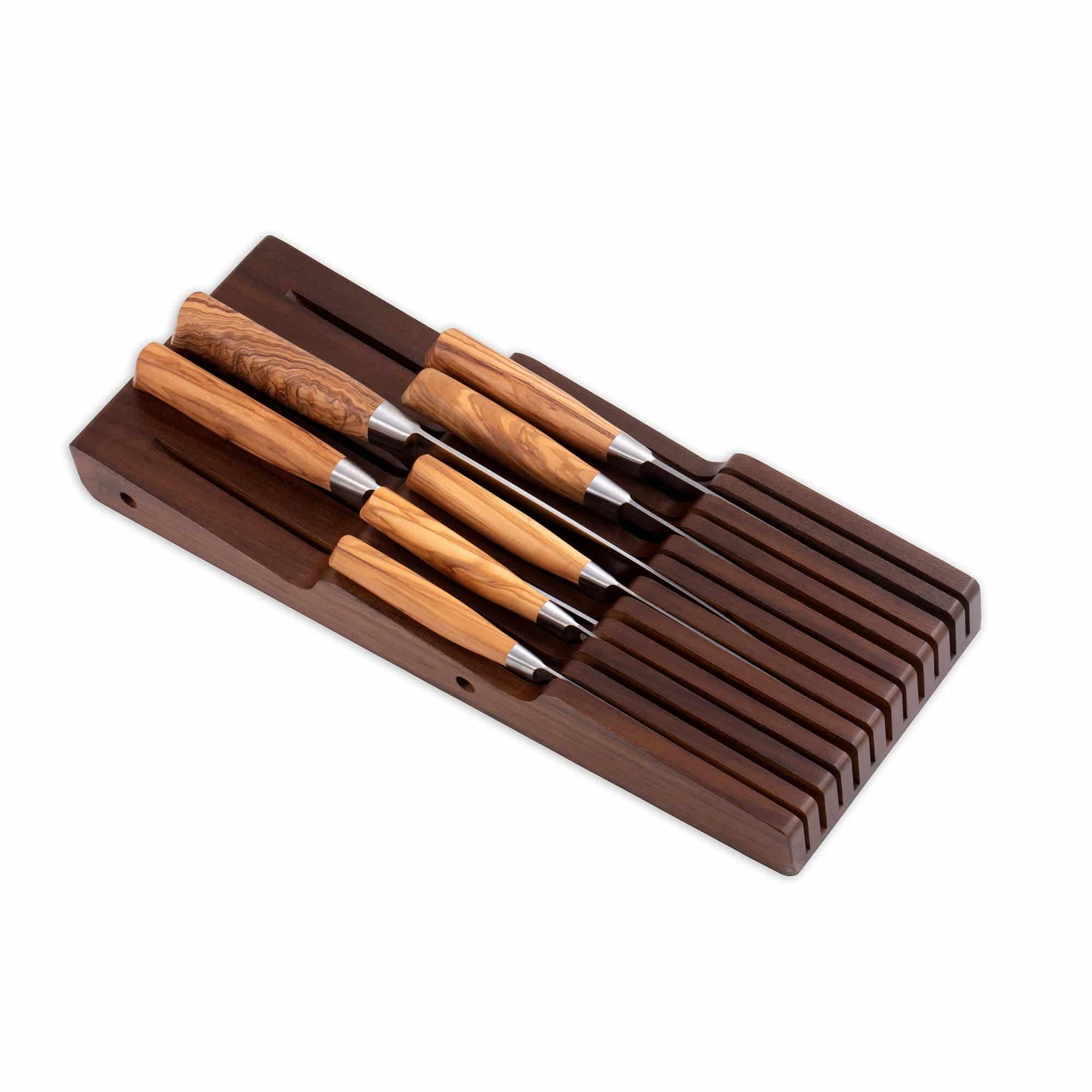 Messermeister 11 Slot Contemporary Acacia In-Drawer Knife Holder shows 7 Olive Wood knives stored within the slots. On a white background tilted up. 