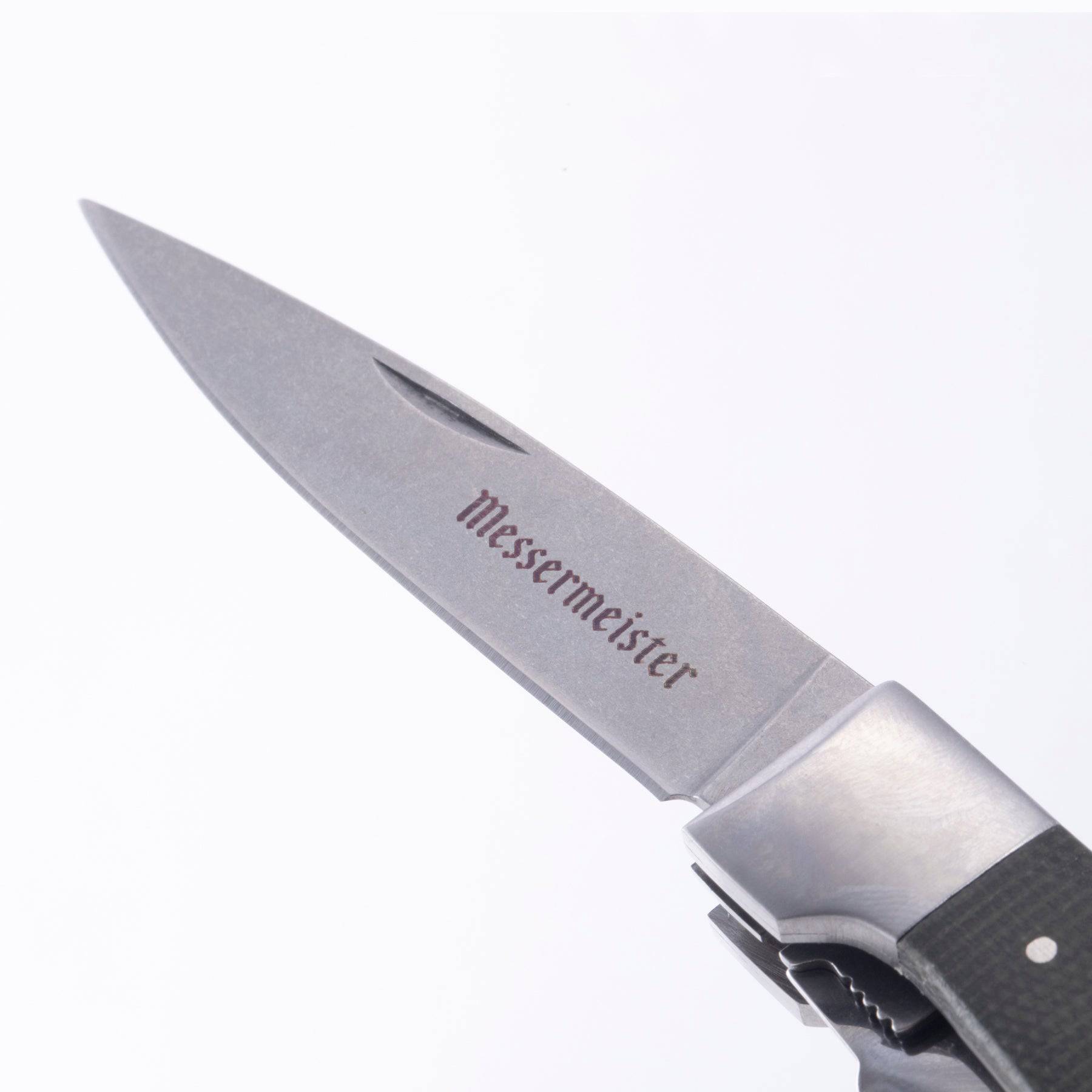 A close up view of the Paring knife extended on the Adventure Chef Folding Peeler and Parer